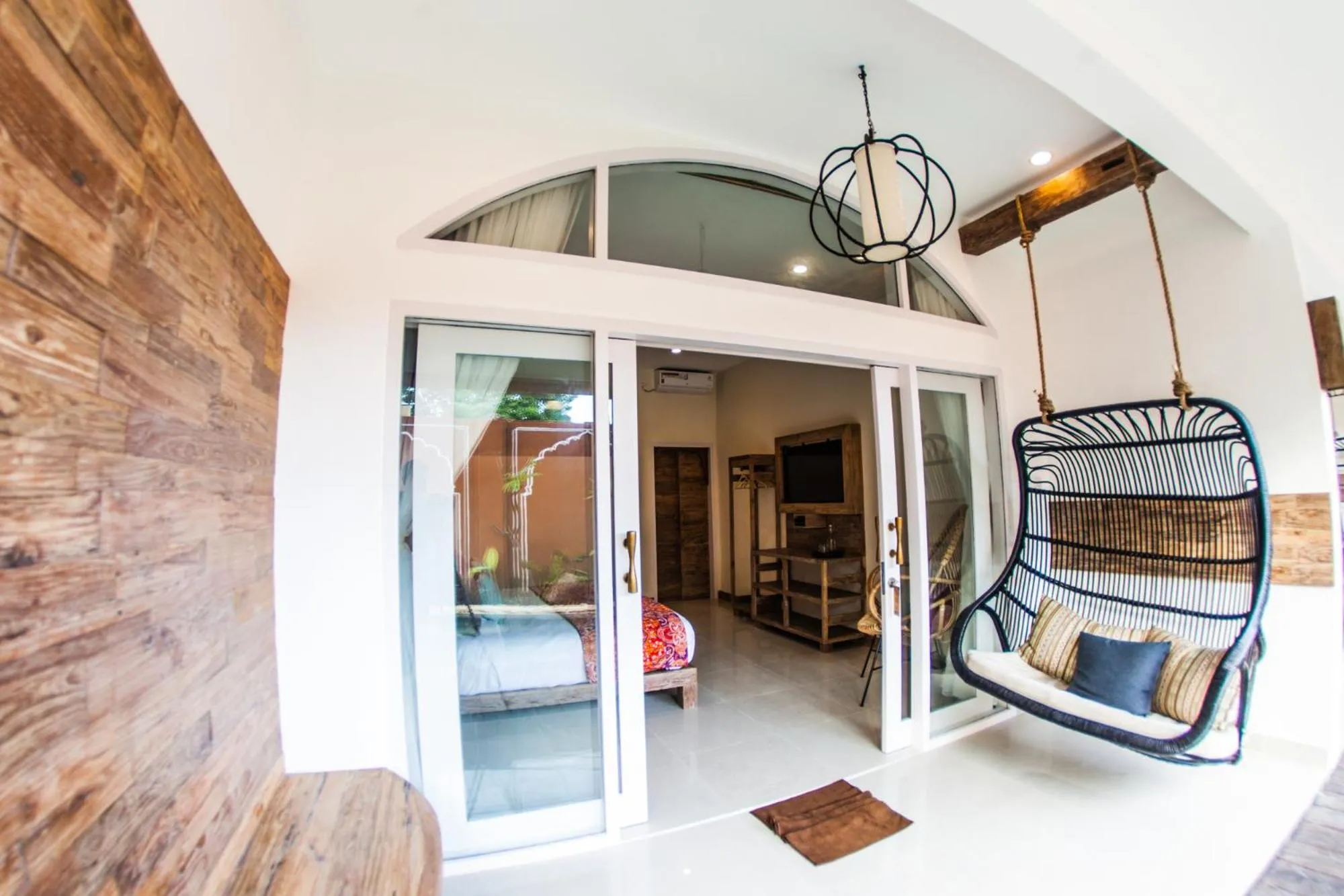 Seating area, Bed in Pesona Beach Resort & Spa - Adults Only