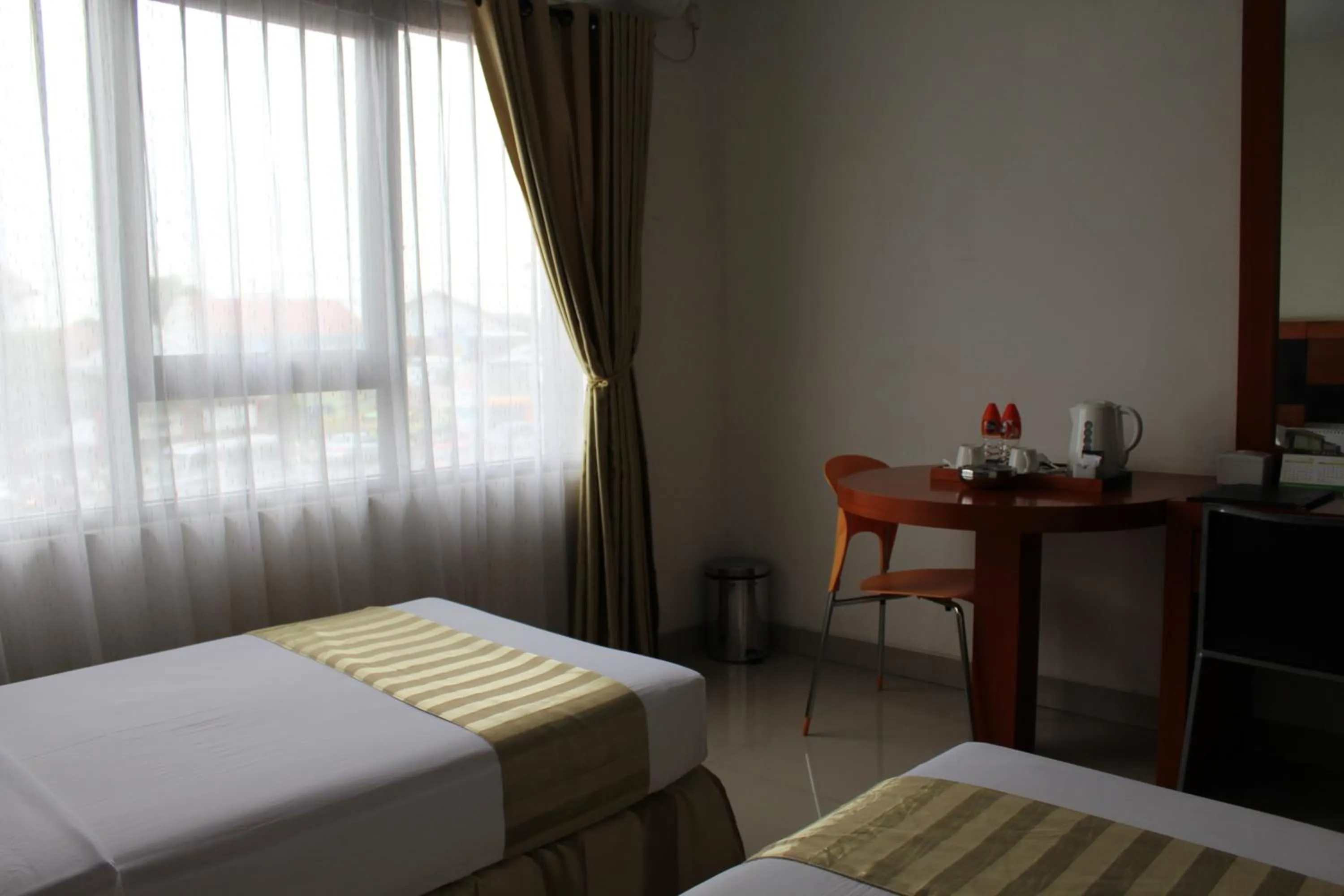 Bed in Hotel Grand Karawang Indah