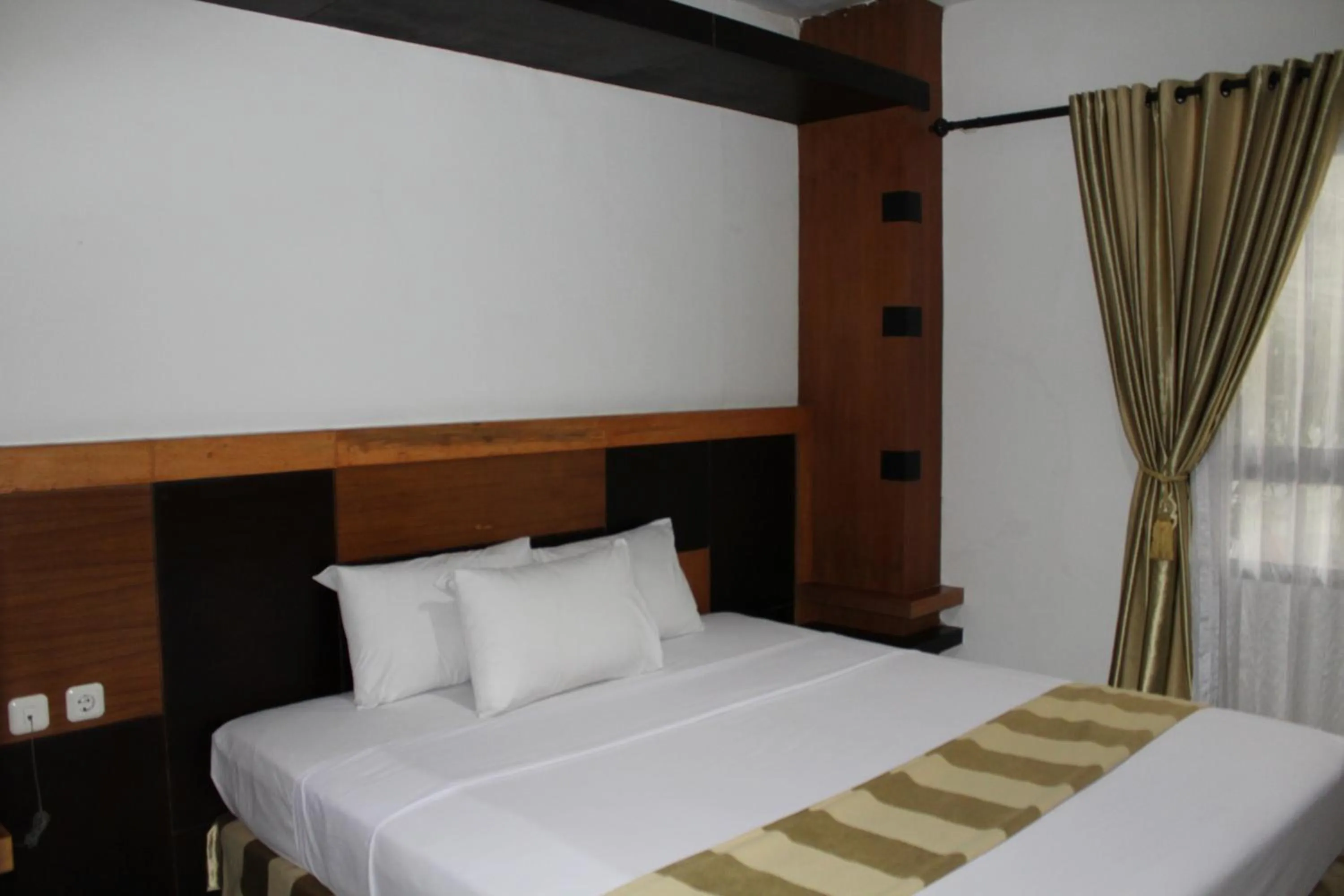 Bed in Hotel Grand Karawang Indah