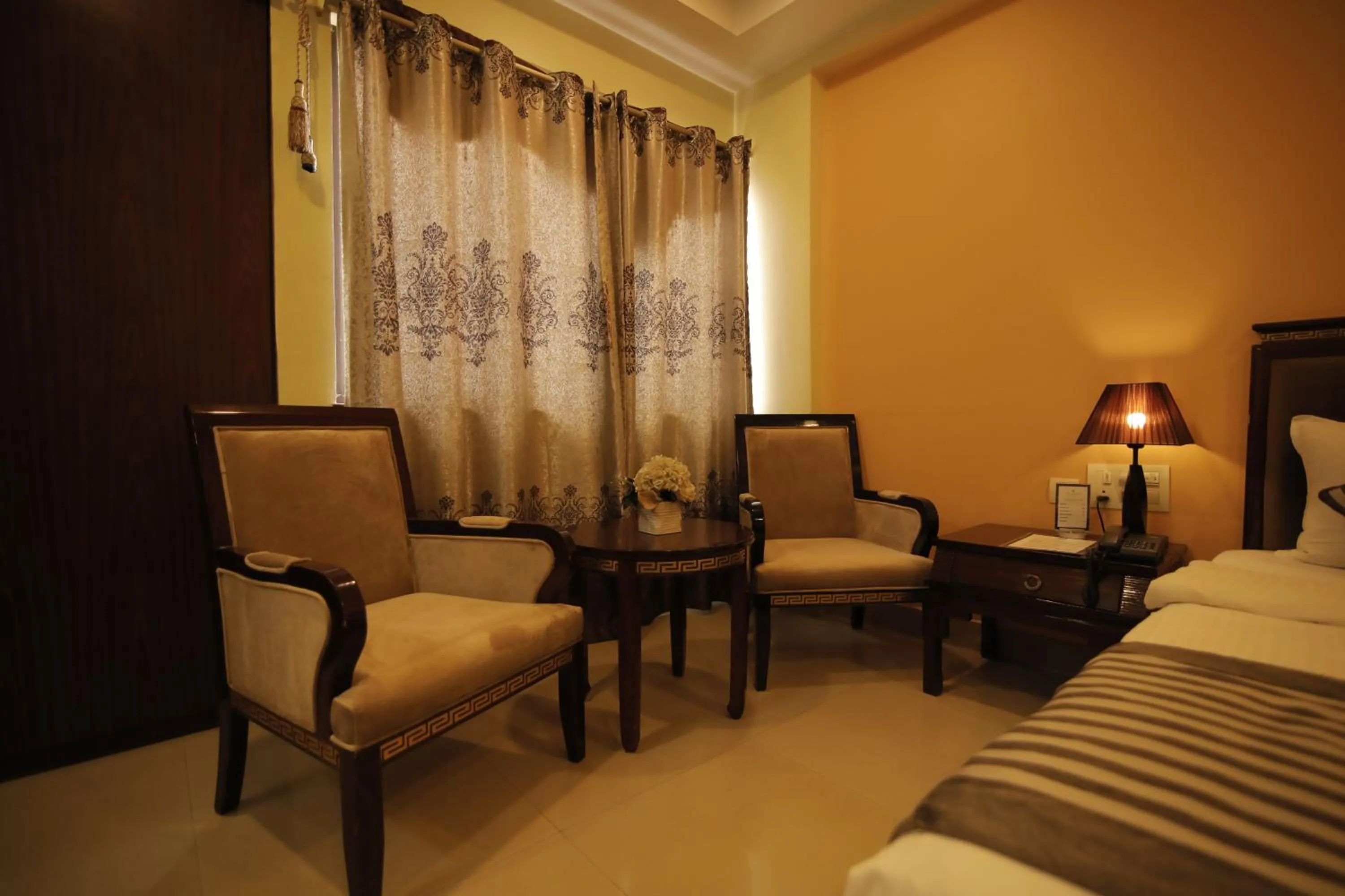 Bed in Hotel KRC Palace