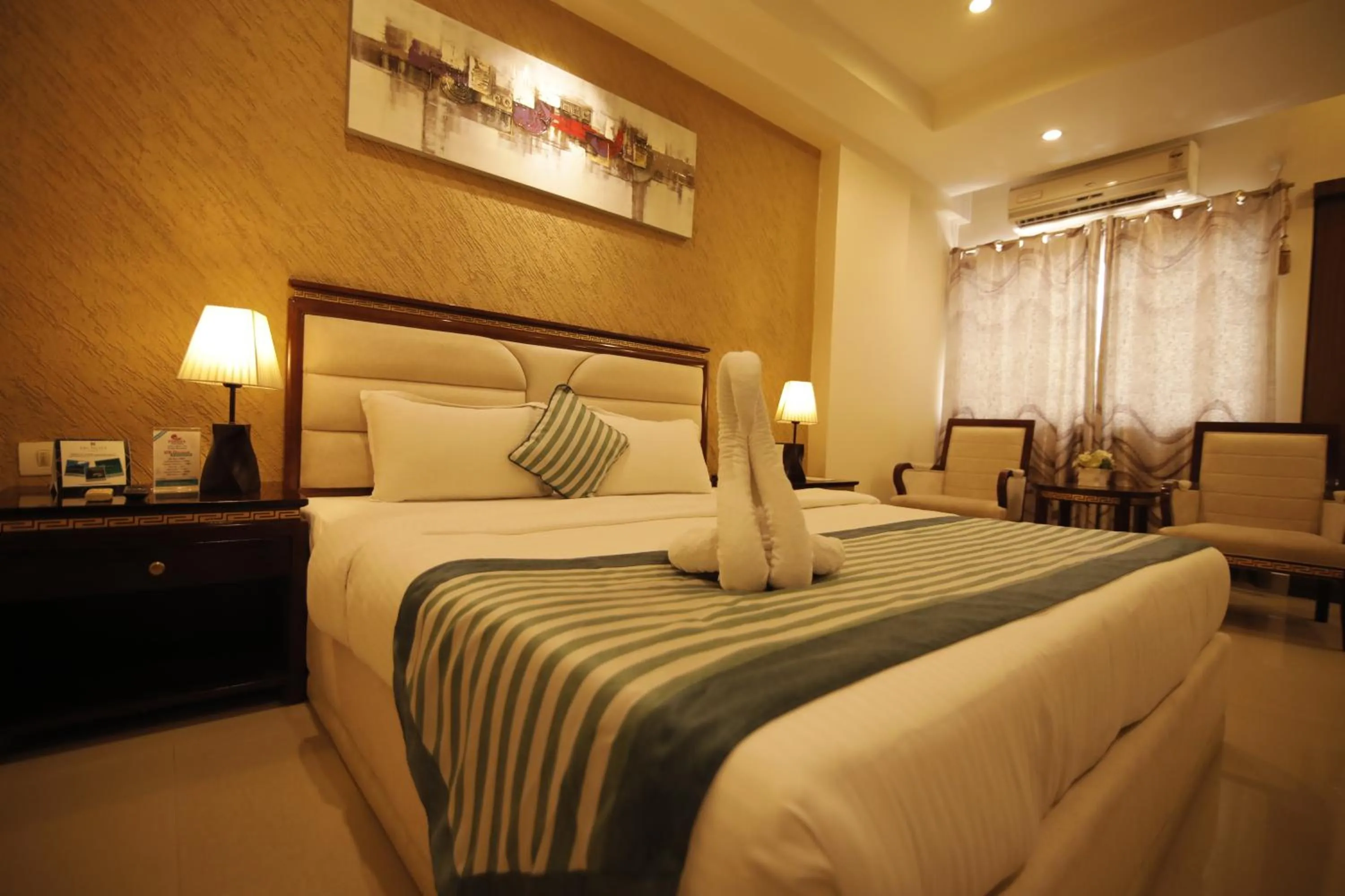 Bed in Hotel KRC Palace