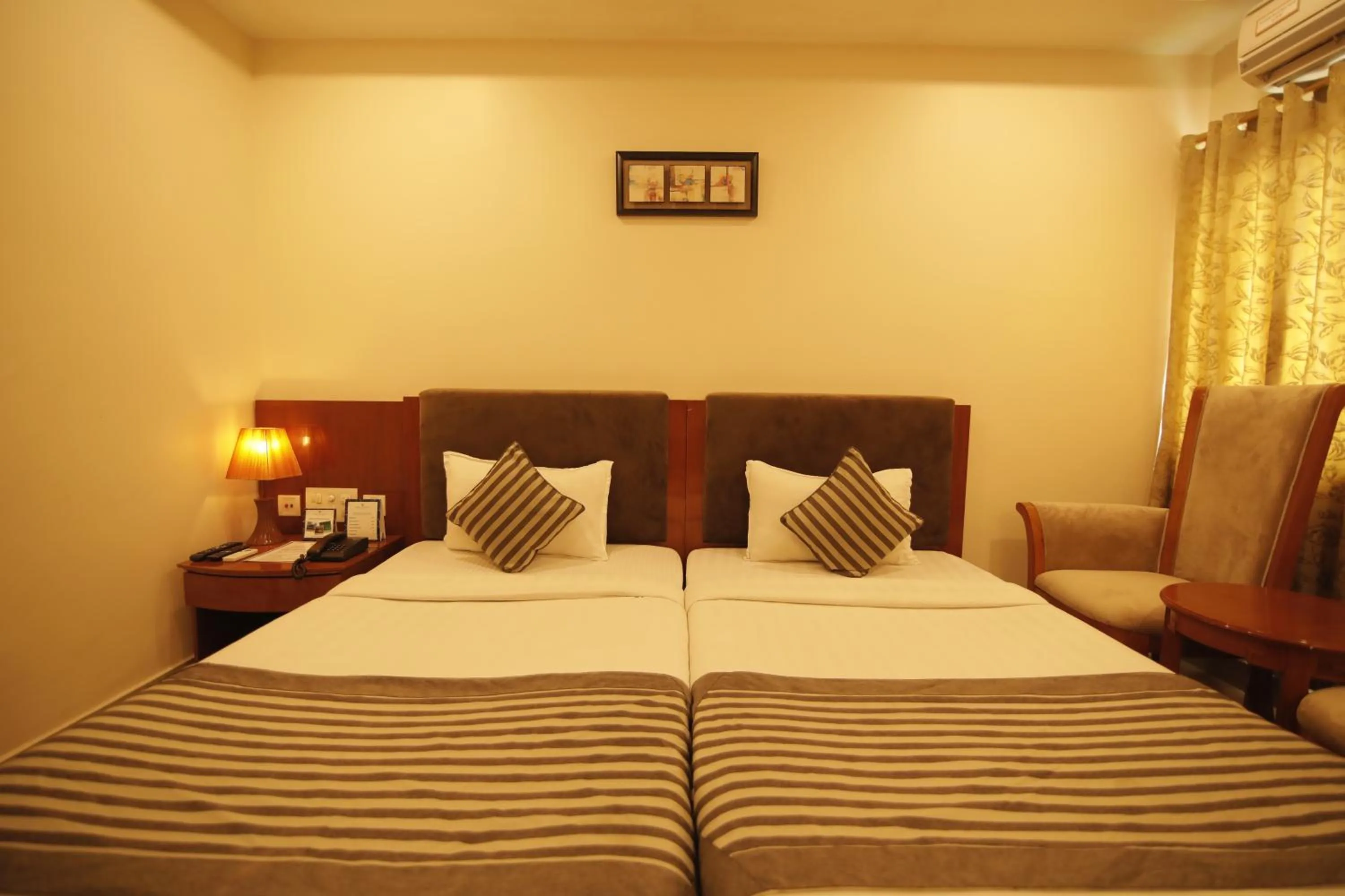 Bed in Hotel KRC Palace