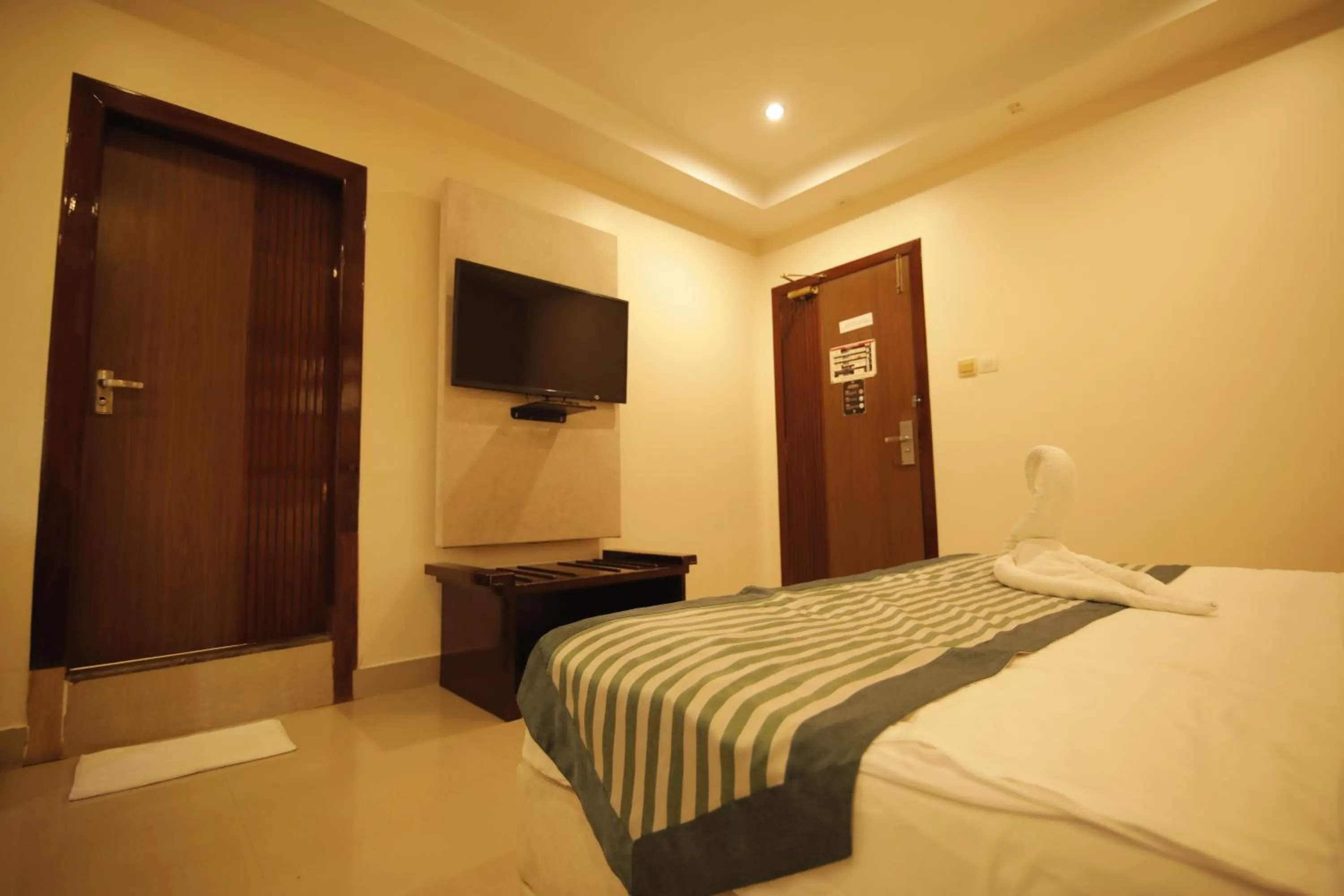 Bed in Hotel KRC Palace