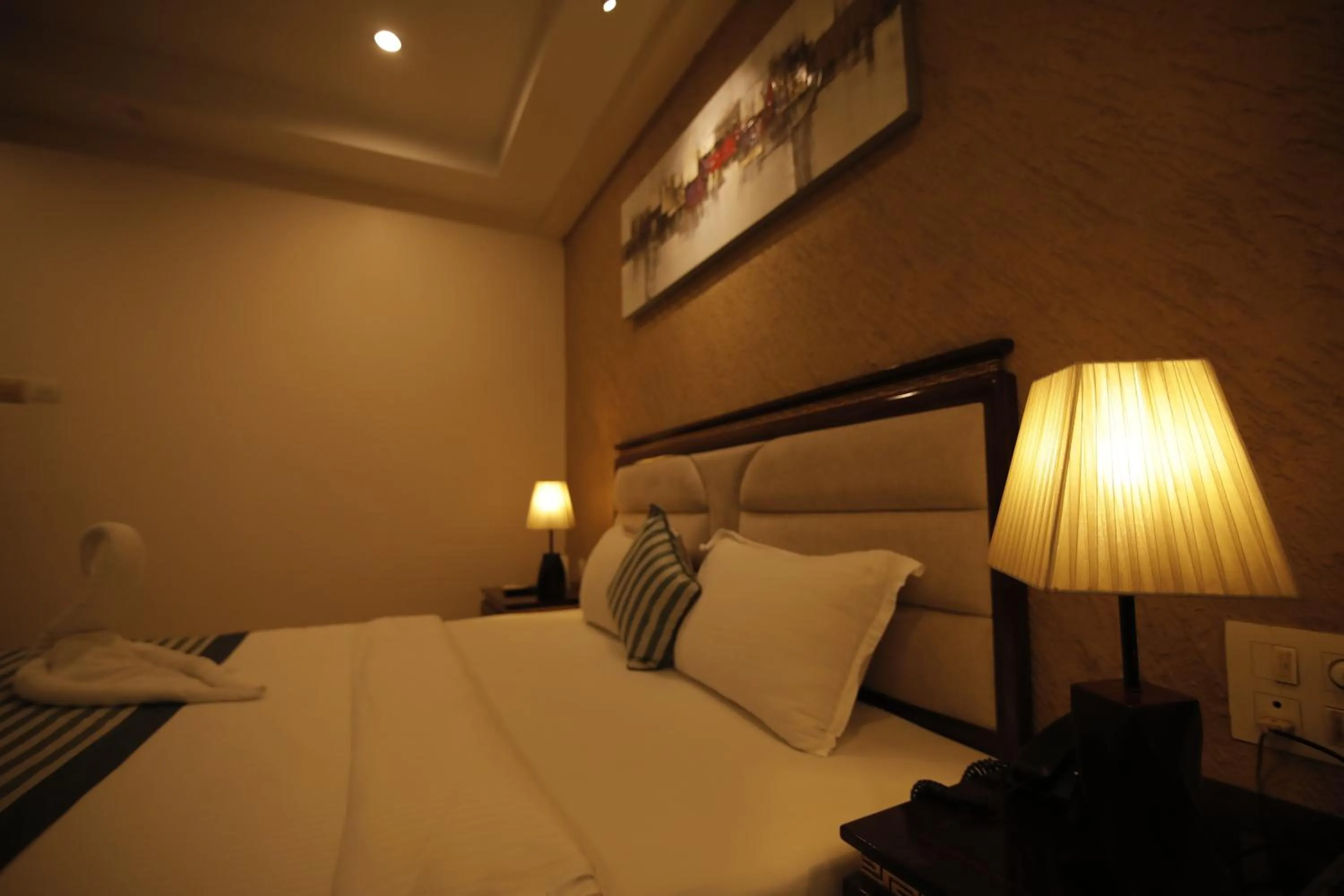 Bed in Hotel KRC Palace