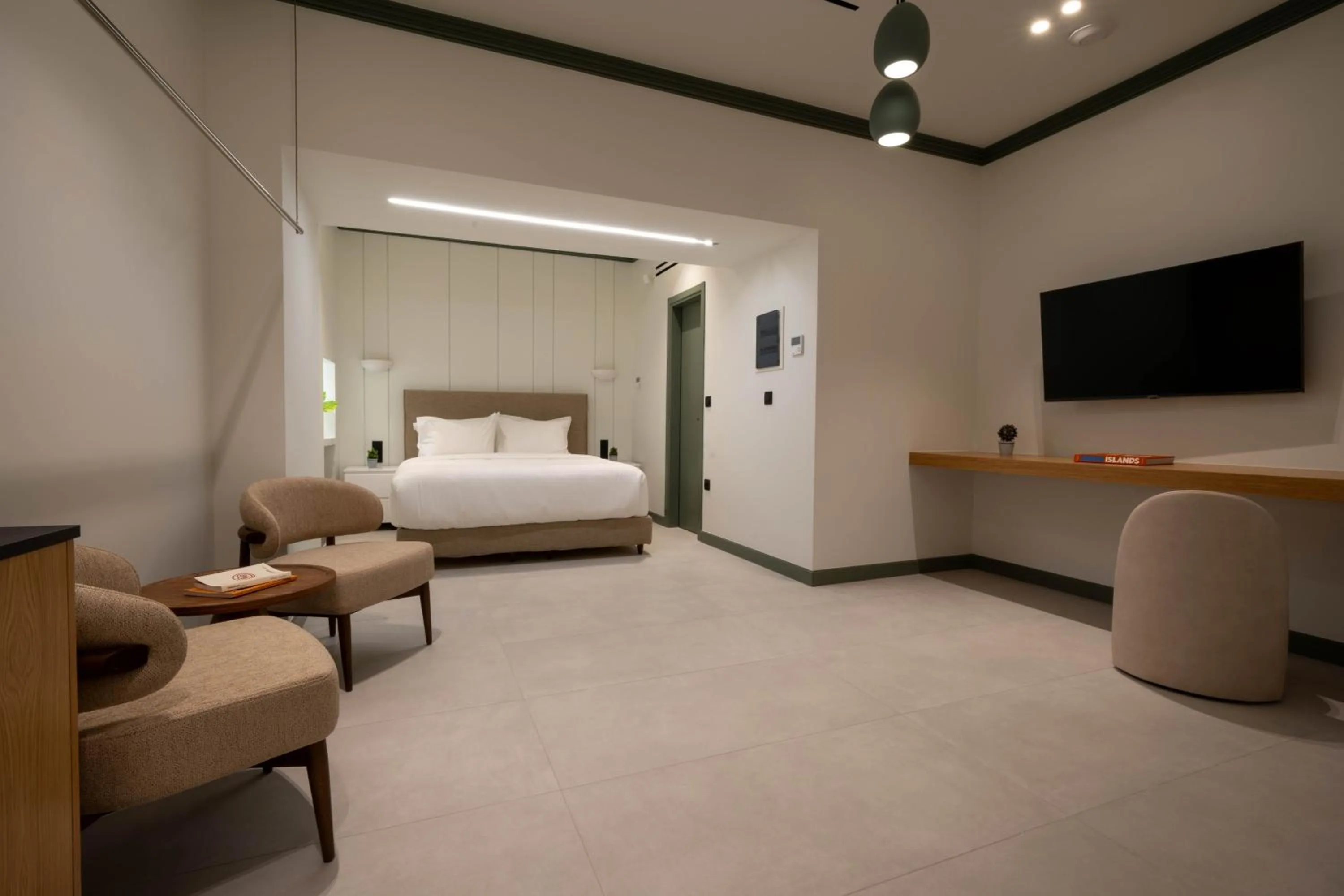 Bed in Whisper Athens Suites