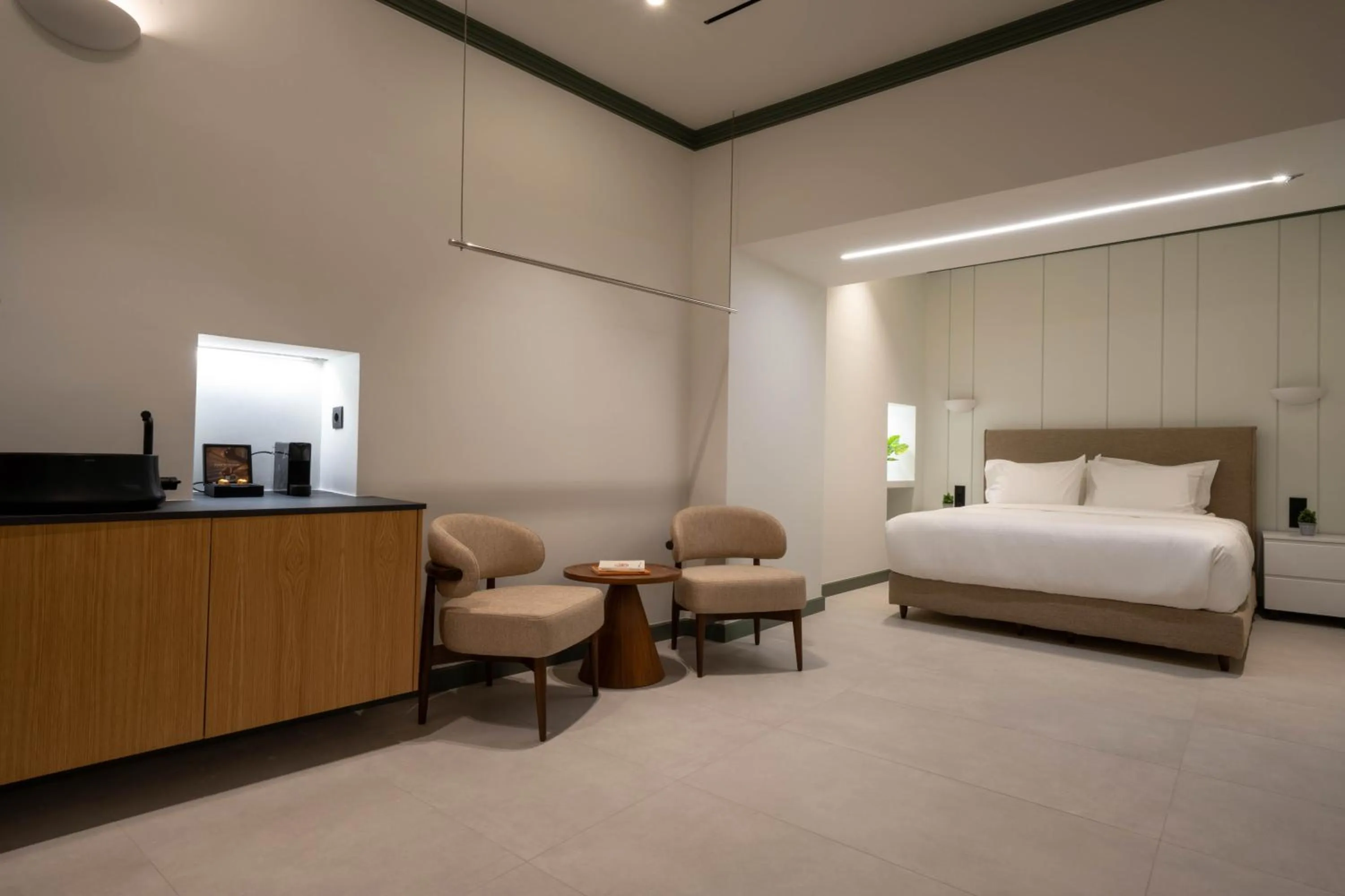 Bed in Whisper Athens Suites