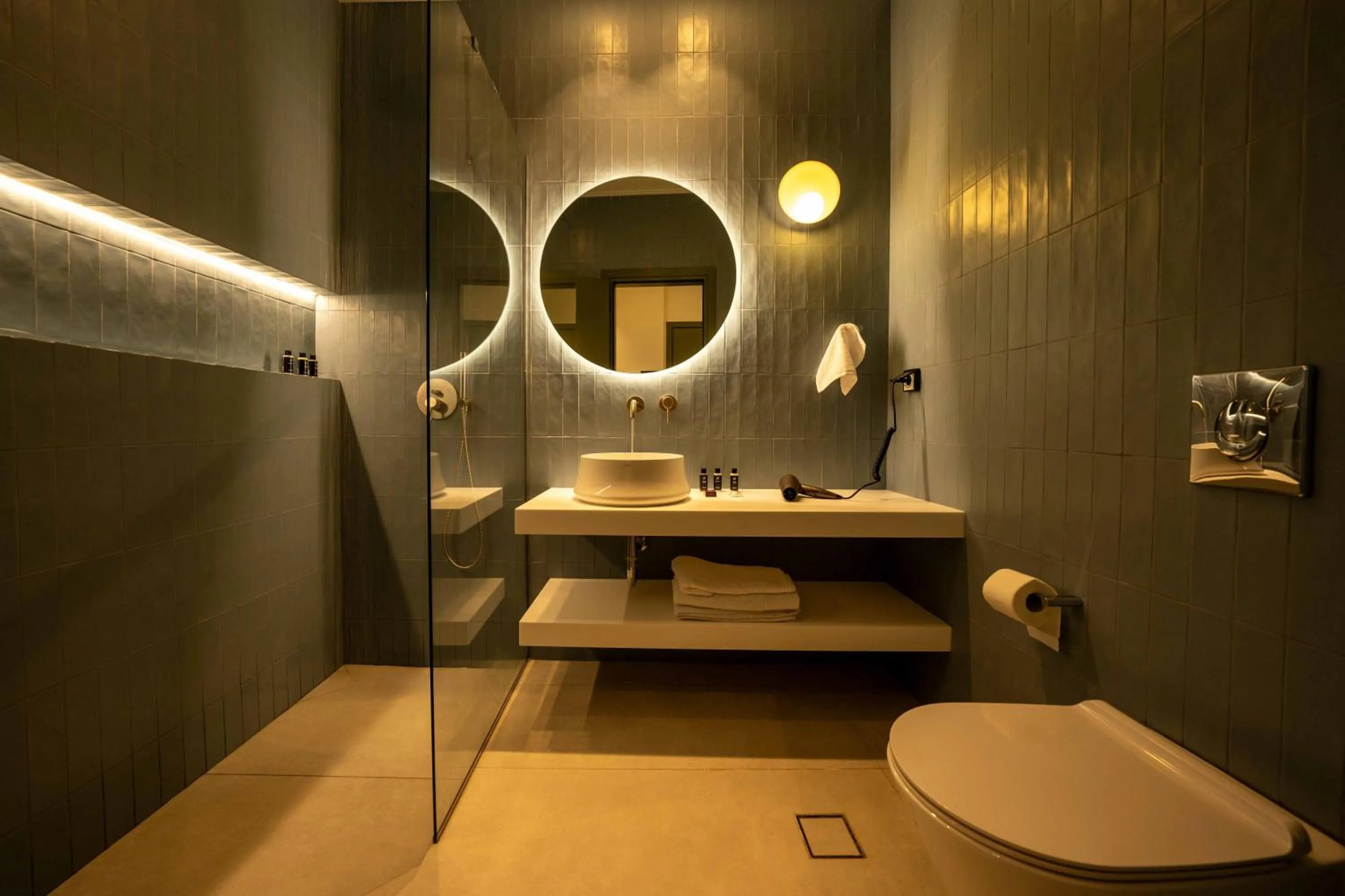 Toilet in Whisper Athens Suites