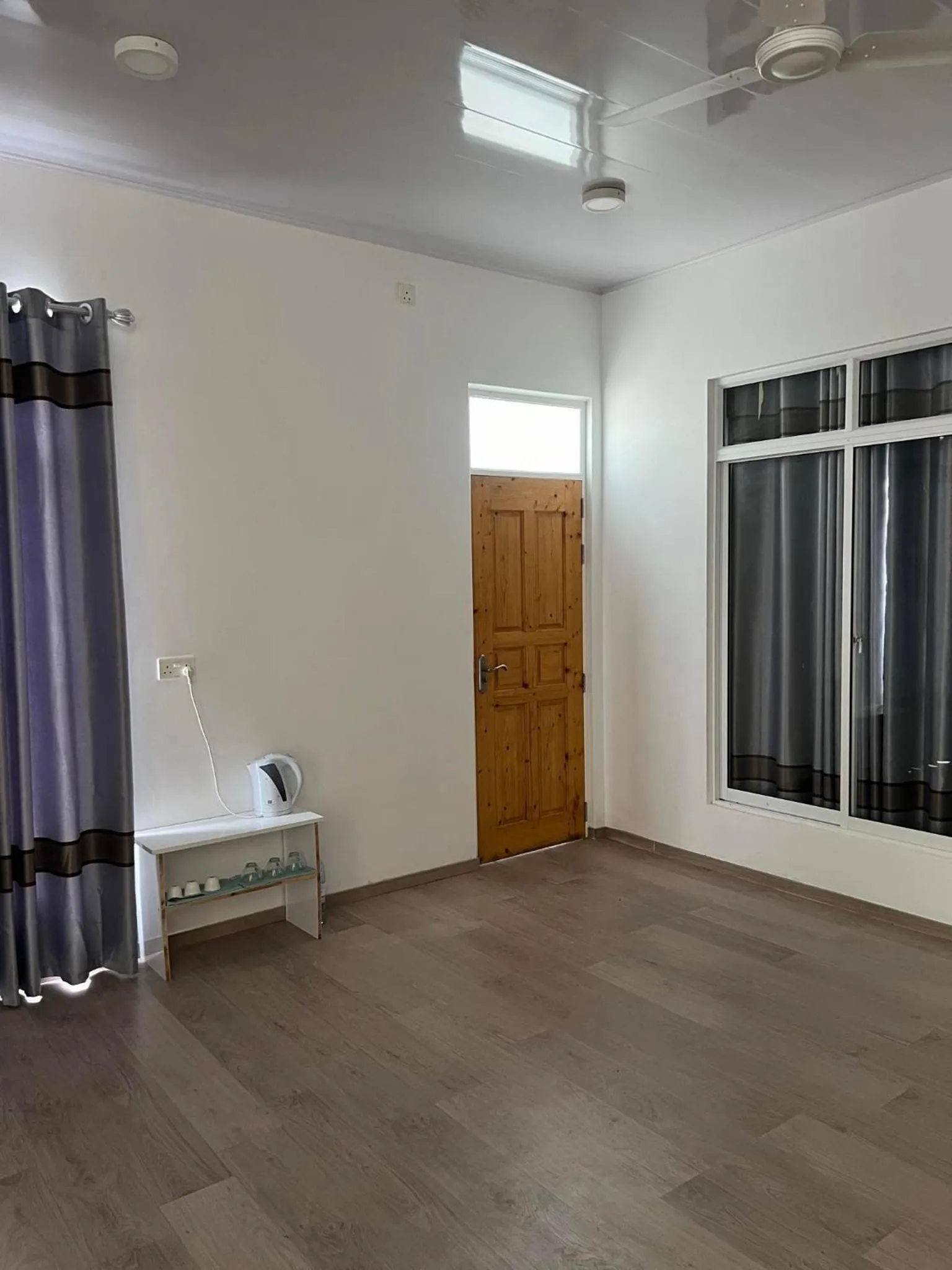 Living room, Bed in Bon Abri Maldives