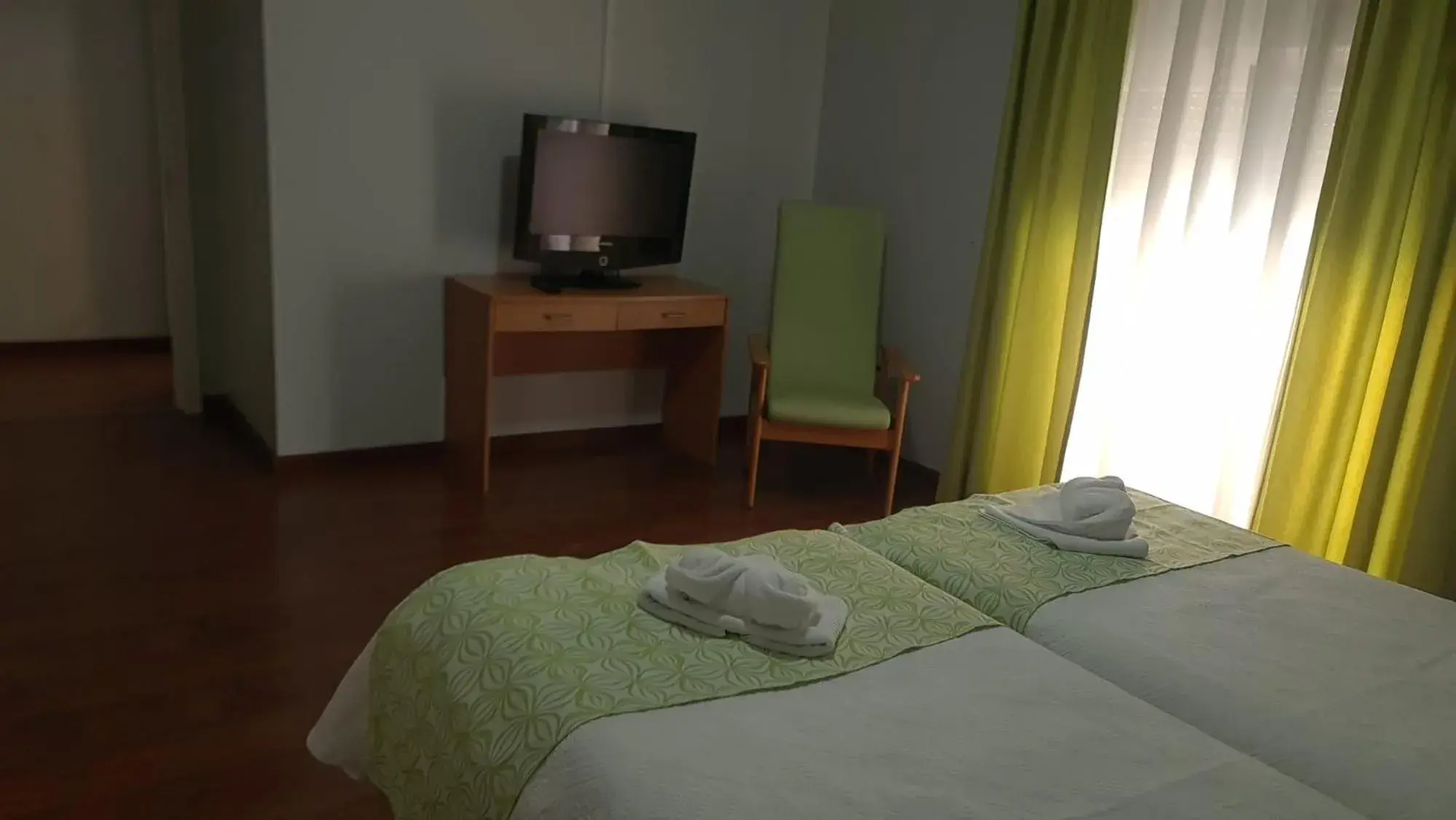 Twin Room in Hostel Jardins de São Luís Twin Room in Hostel Jardins de São Luís