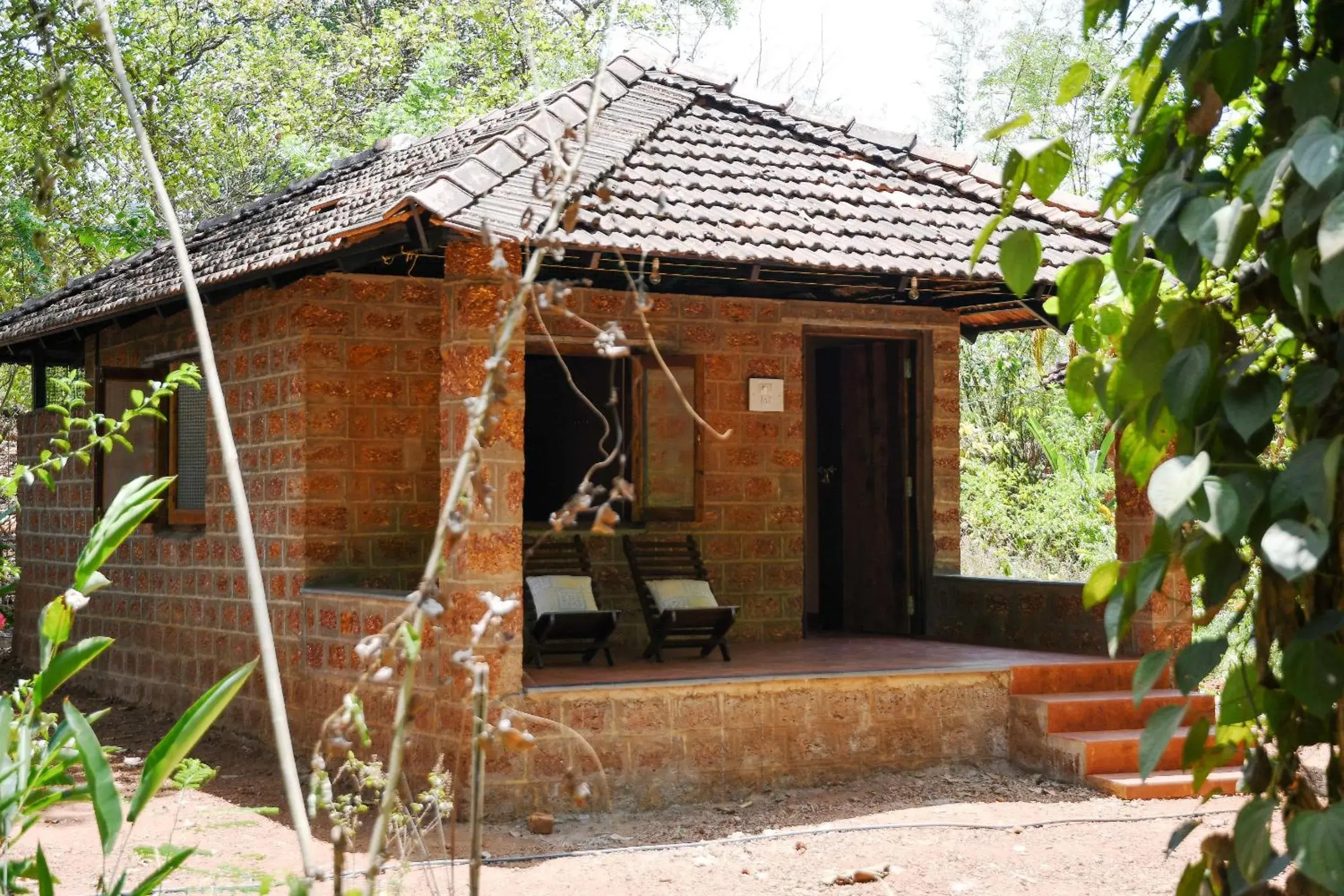 Deluxe Bungalow with Garden View in Dudhsagar Plantation Deluxe Bungalow with Garden View in Dudhsagar Plantation