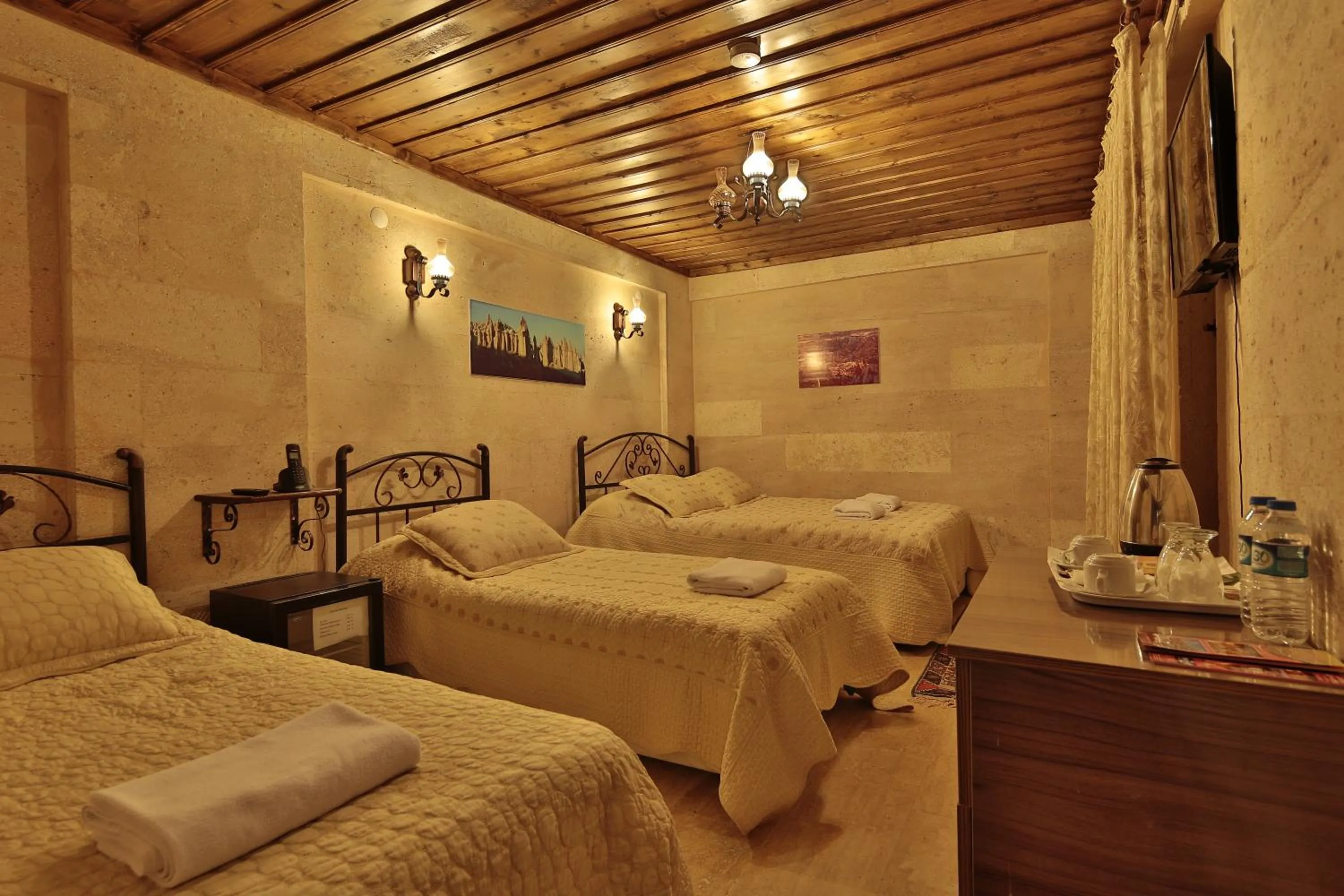Bed in Goreme Cave Rooms&Pool