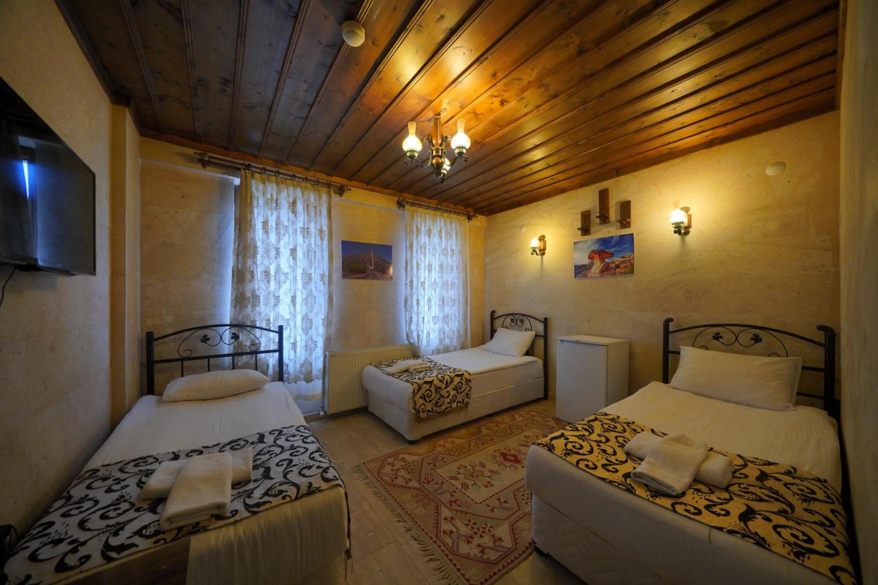 Bed in Goreme Cave Rooms&Pool