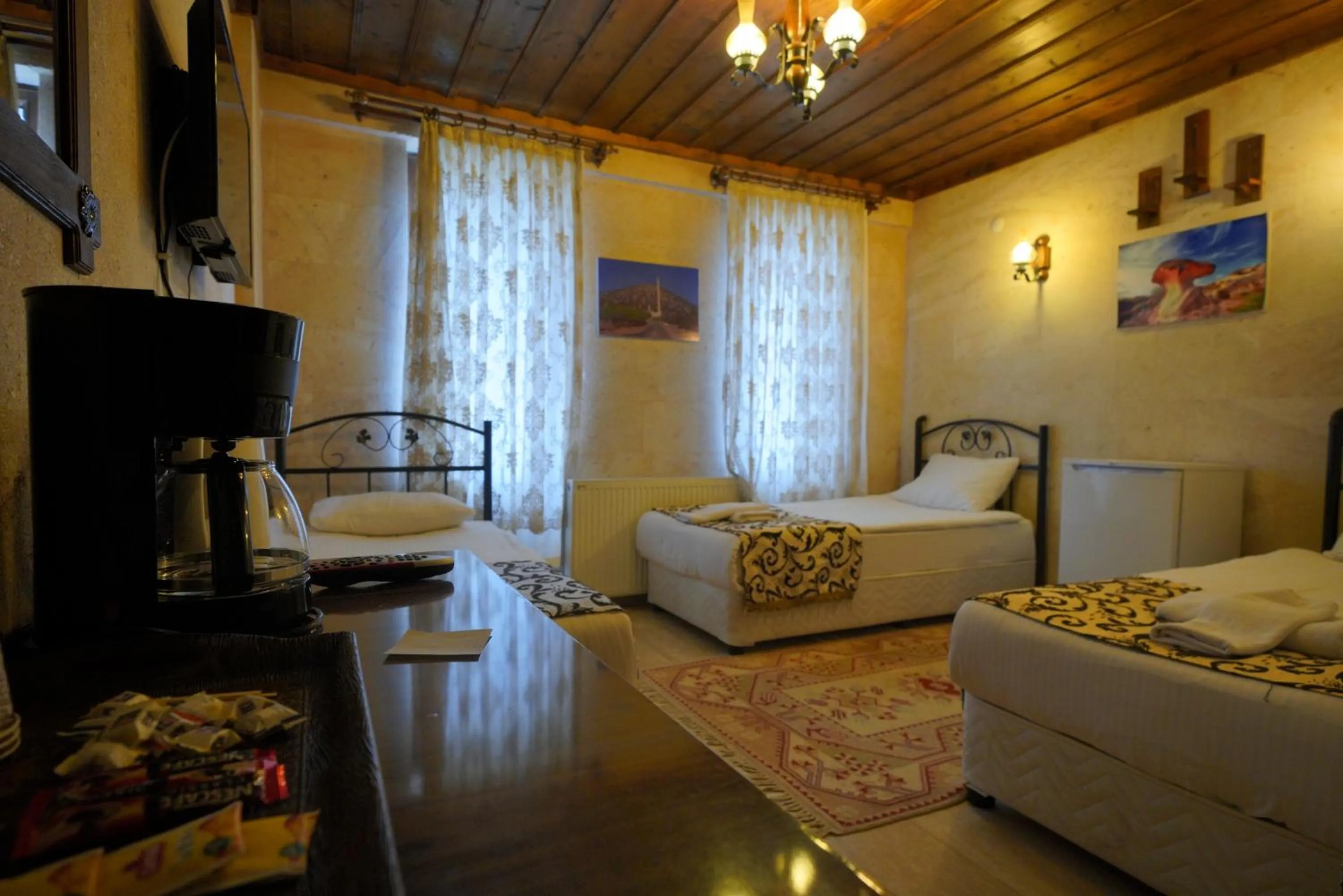 Bed in Goreme Cave Rooms&Pool