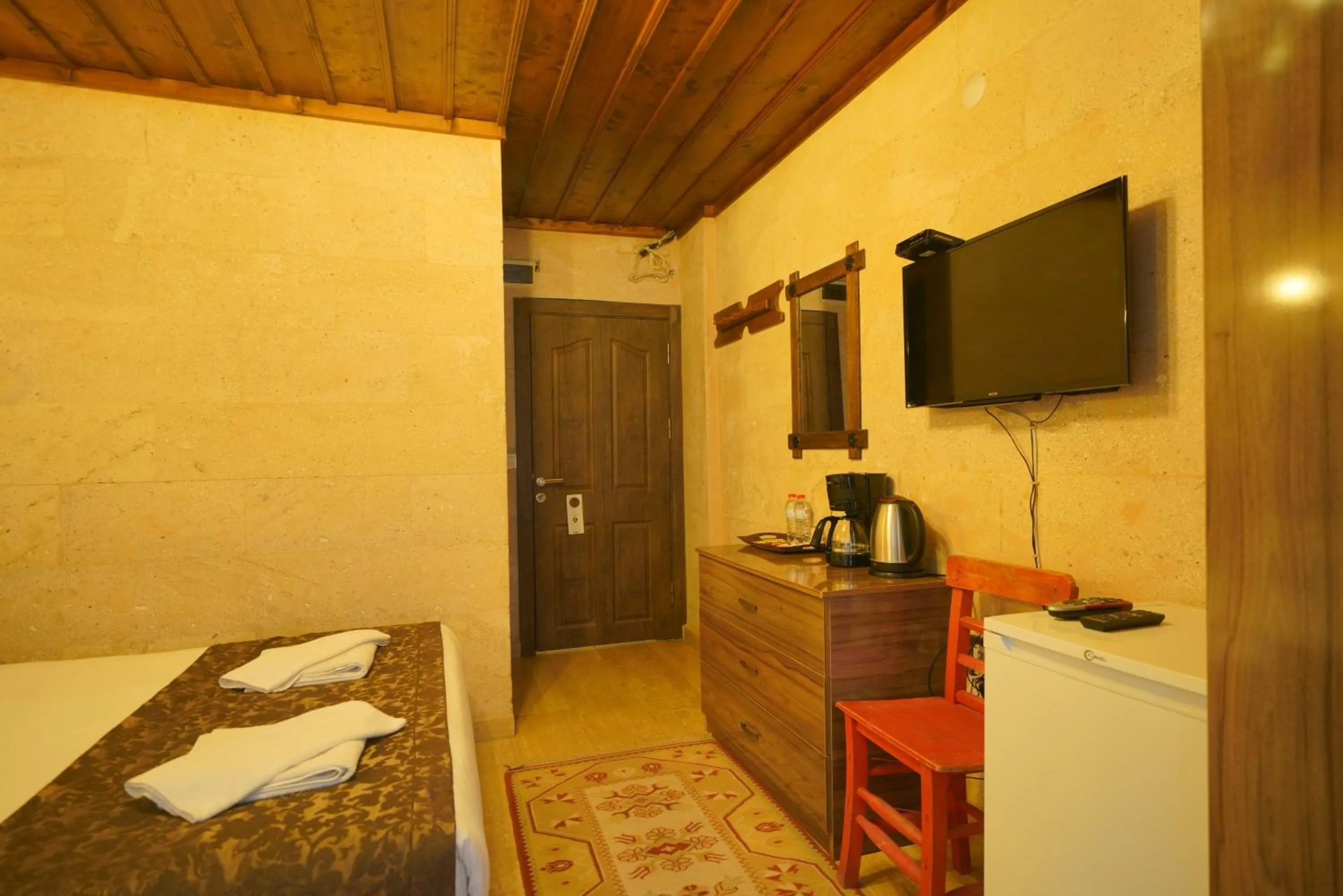 Bed in Goreme Cave Rooms&Pool