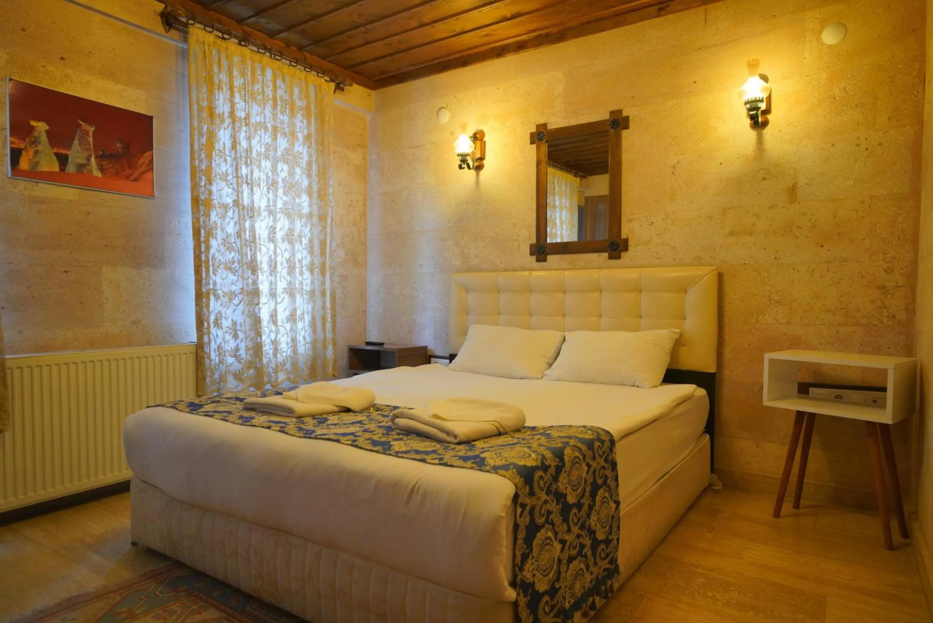 Bed in Goreme Cave Rooms&Pool