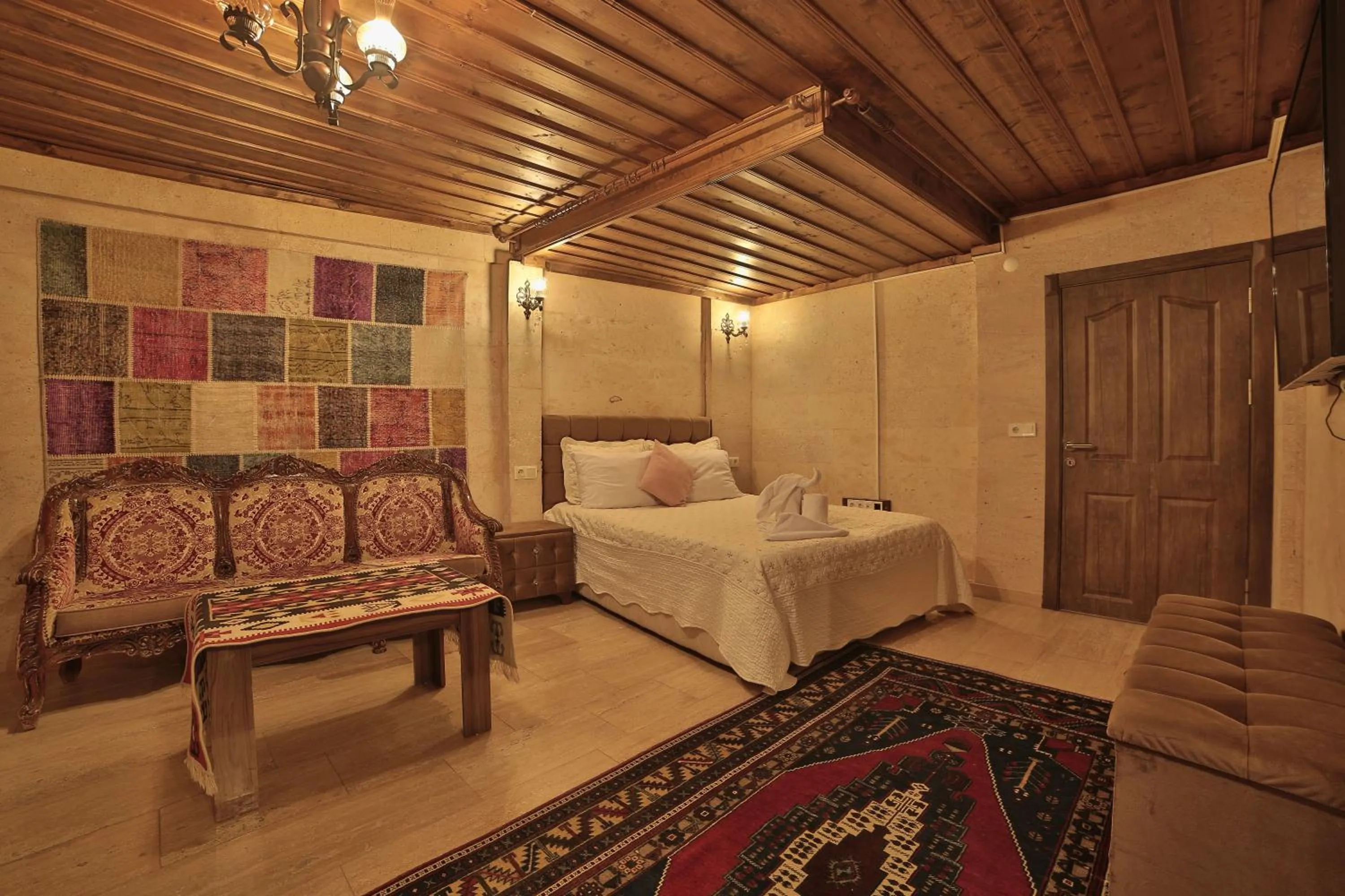 Bed in Goreme Cave Rooms&Pool