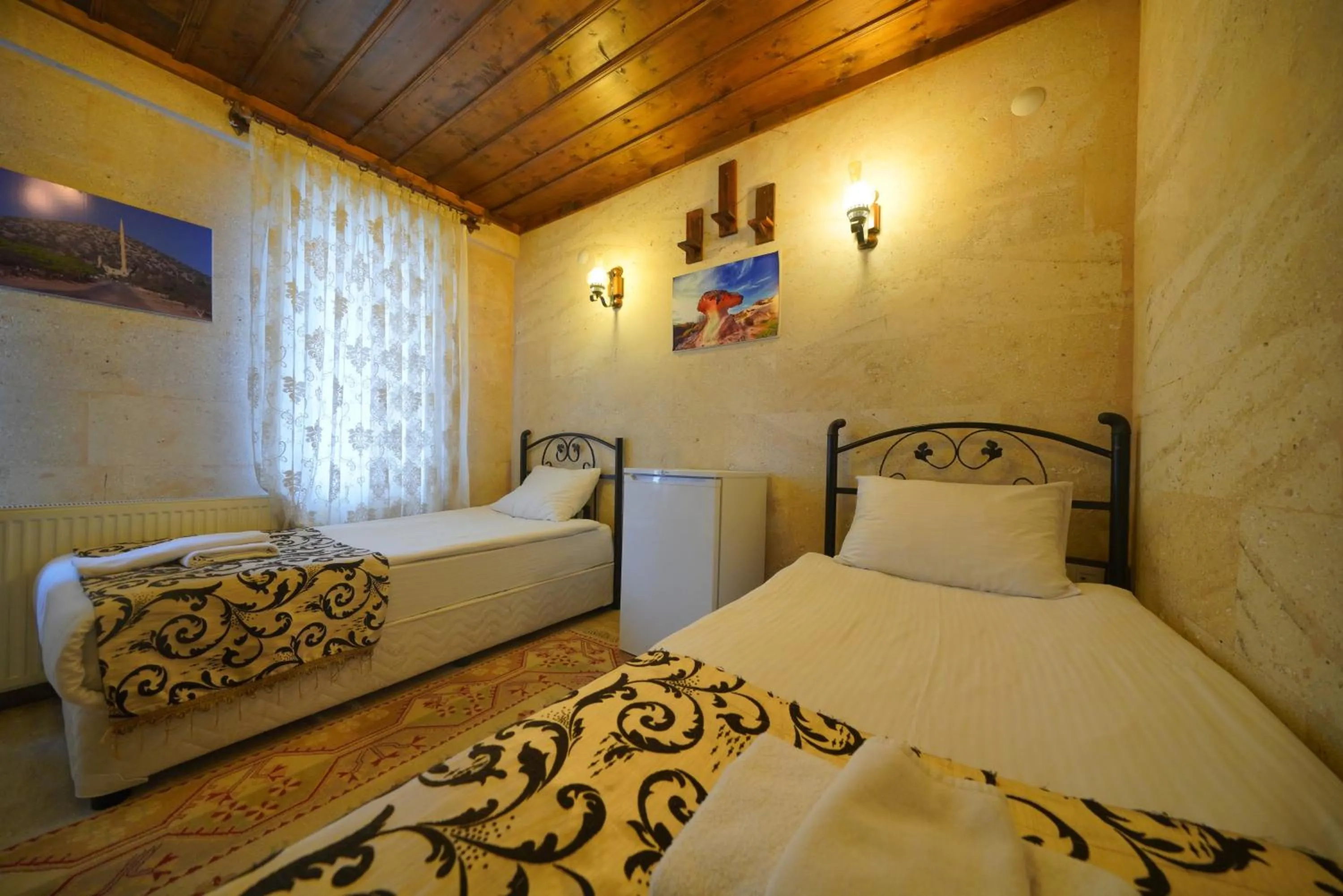 Bed in Goreme Cave Rooms&Pool