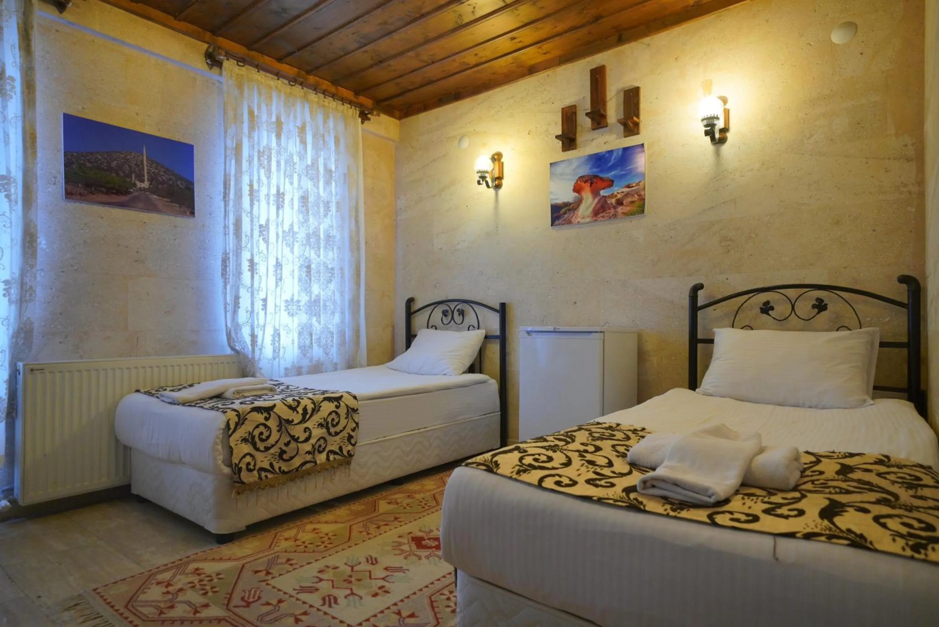 Bed in Goreme Cave Rooms&Pool