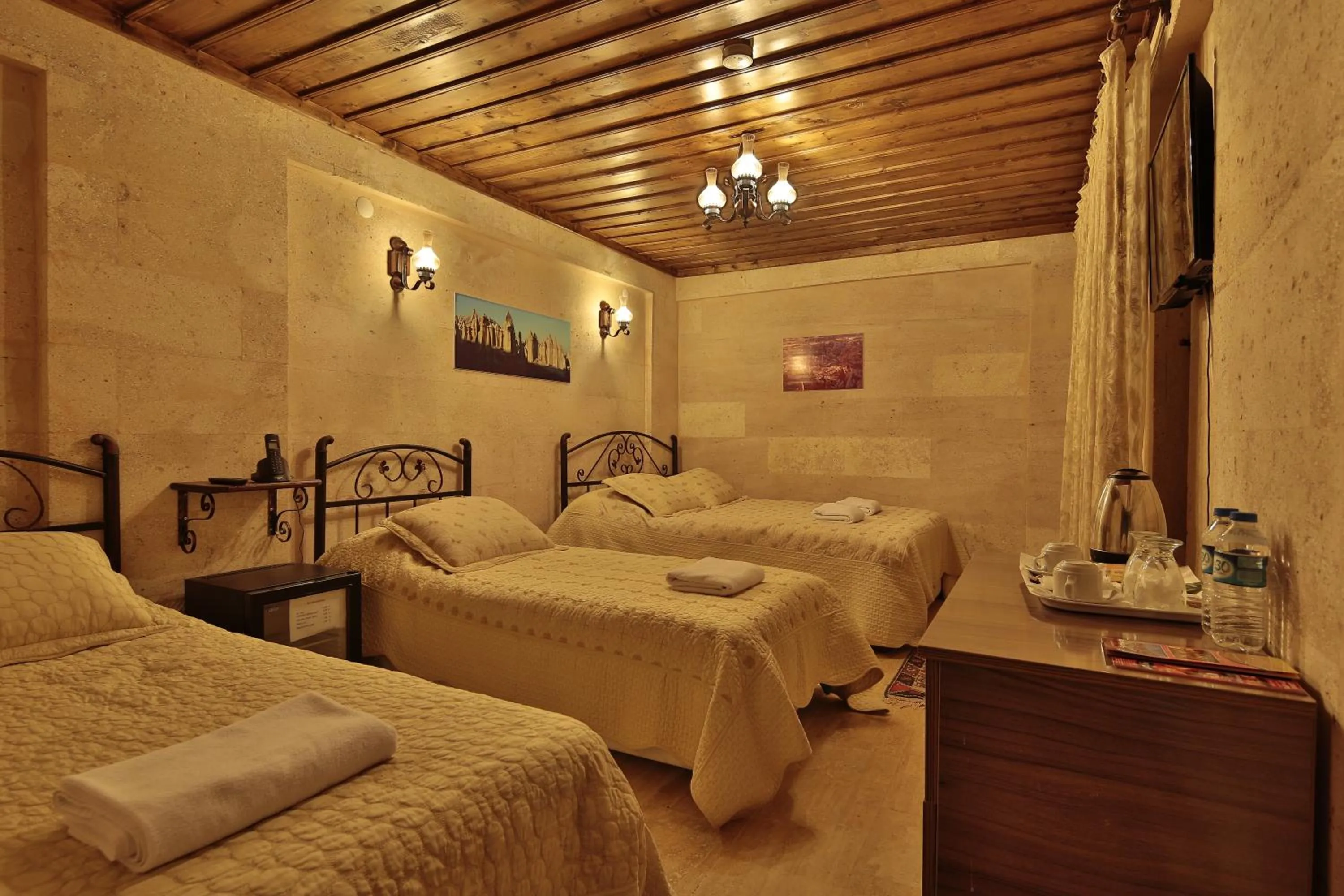 Bed in Goreme Cave Rooms&Pool