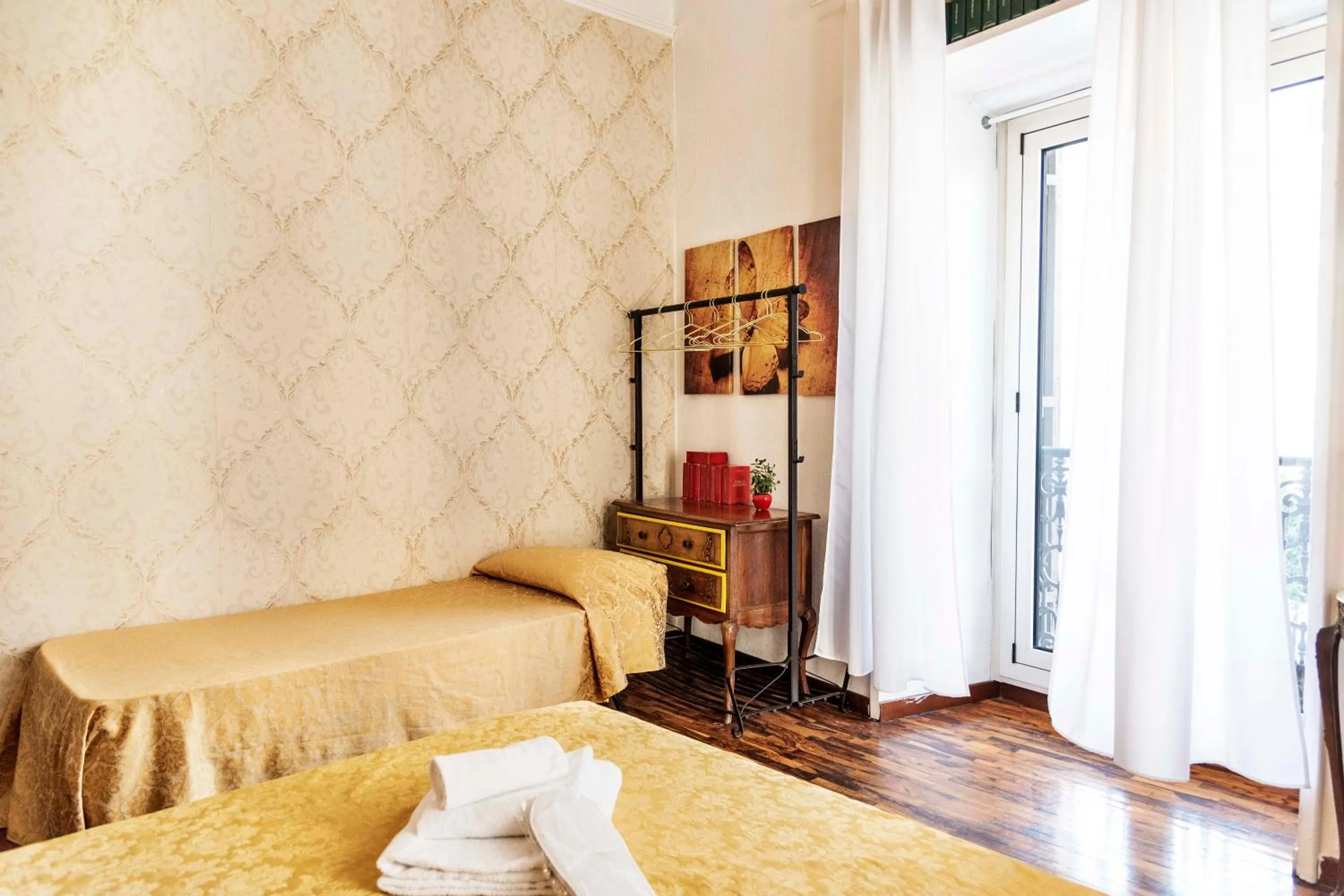 Photo of the whole room, Bed in Merulana Suite Apartment