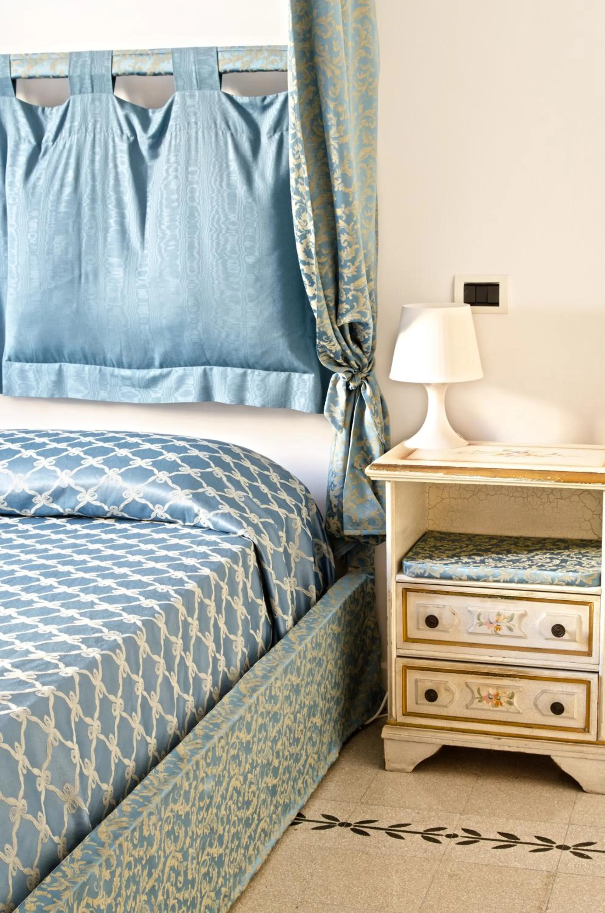 Decorative detail, Bed in Merulana Suite Apartment