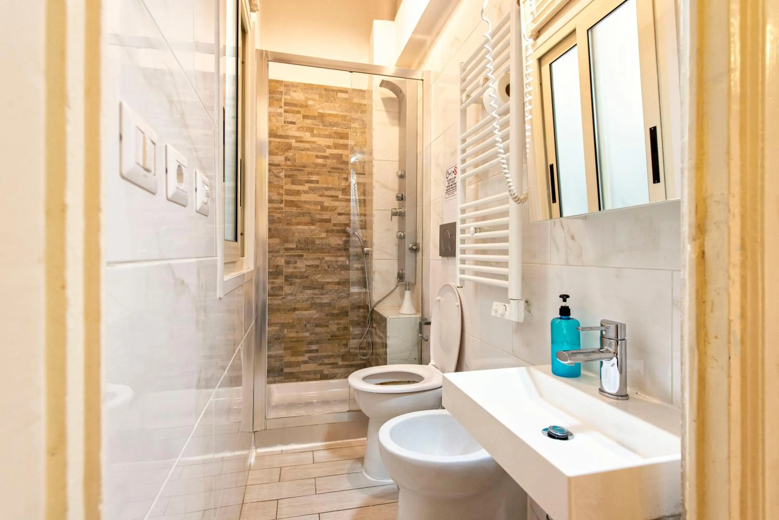 Toilet in Merulana Suite Apartment