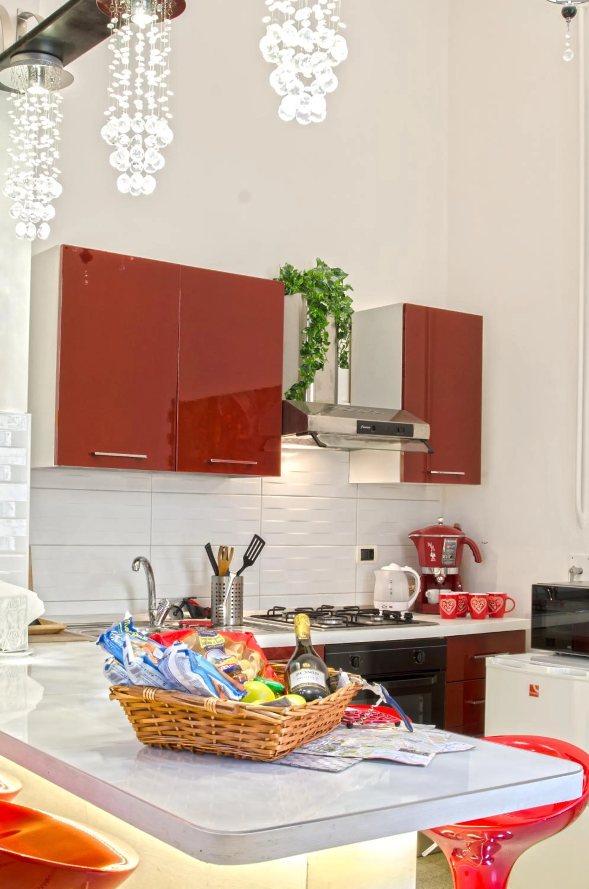Kitchen or kitchenette in Merulana Suite Apartment