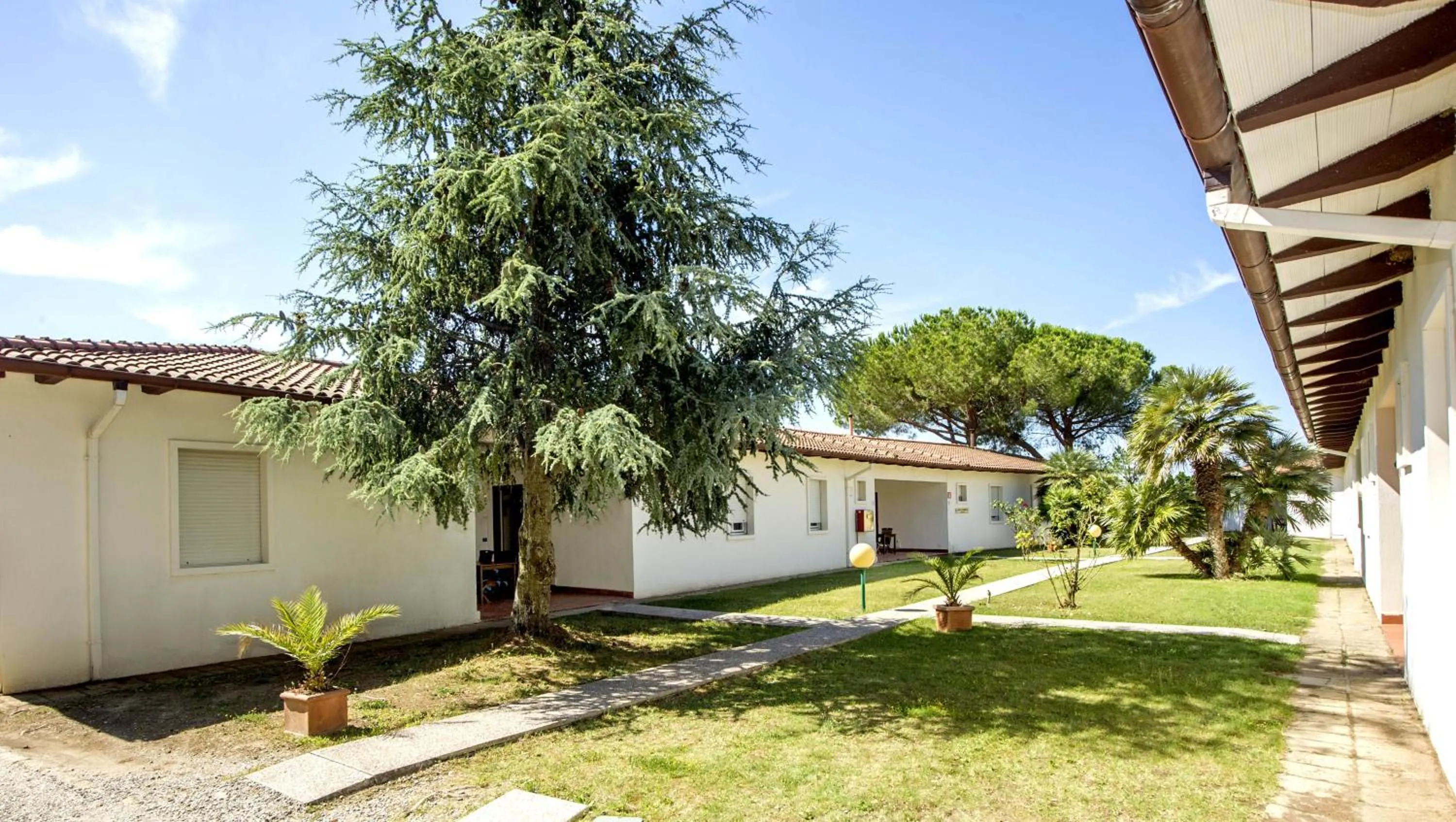 Property building in Il Pelagone Hotel & Golf Resort Toscana