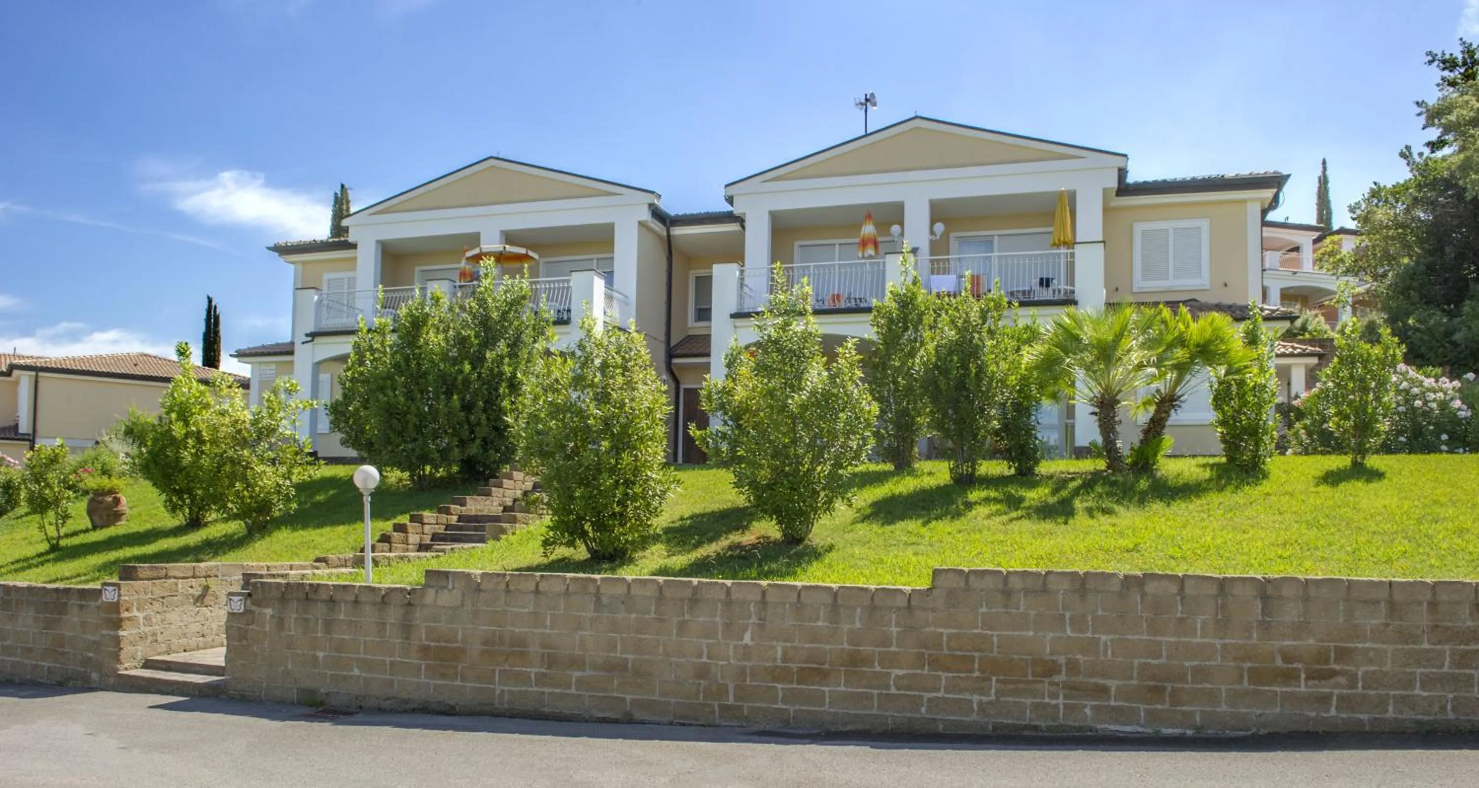 Property building in Il Pelagone Hotel & Golf Resort Toscana