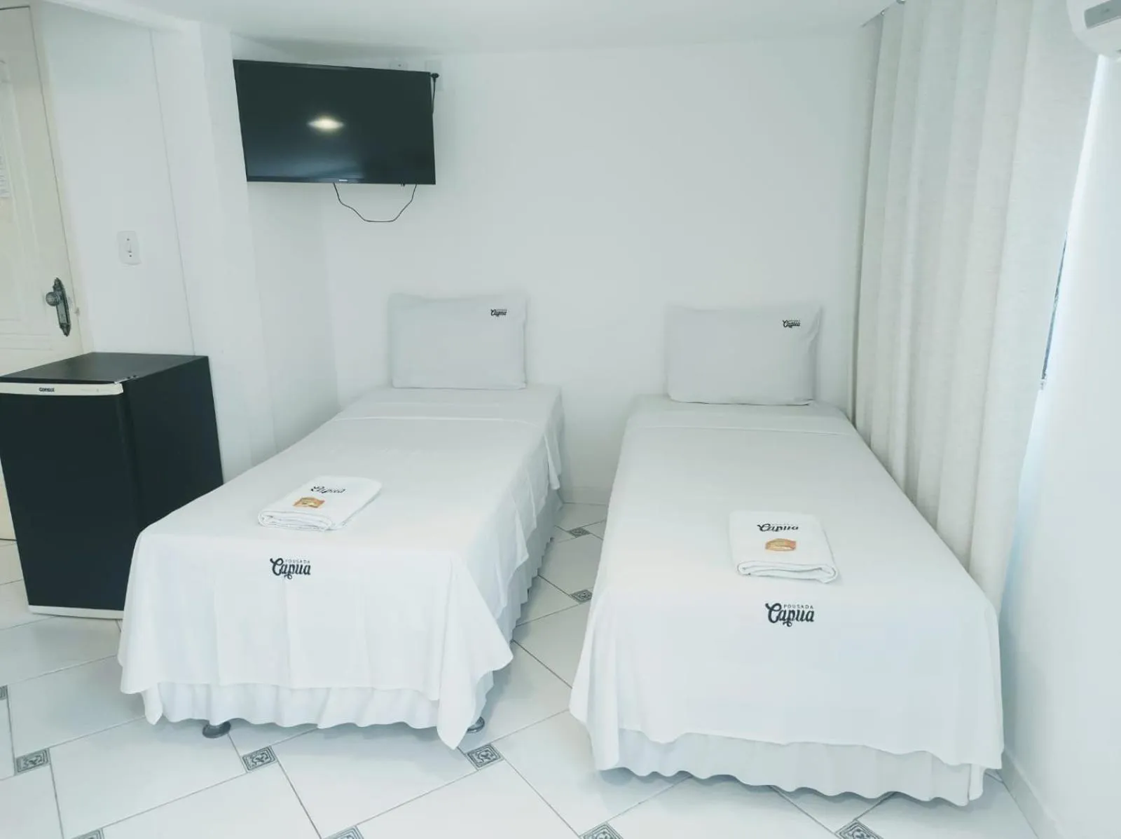 Bed in Pousada Capua Buzios