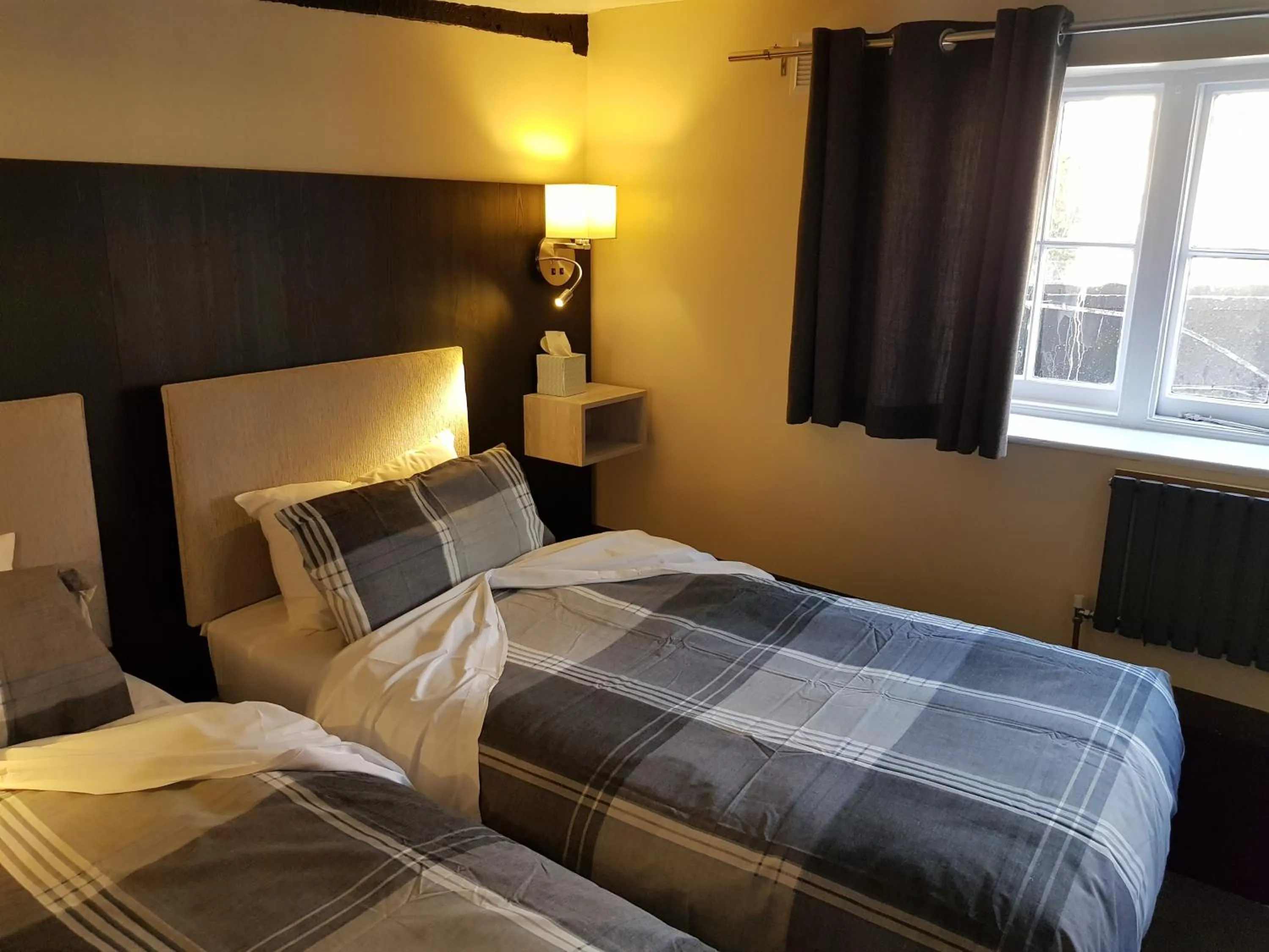 Bed in The Old Black Horse Inn