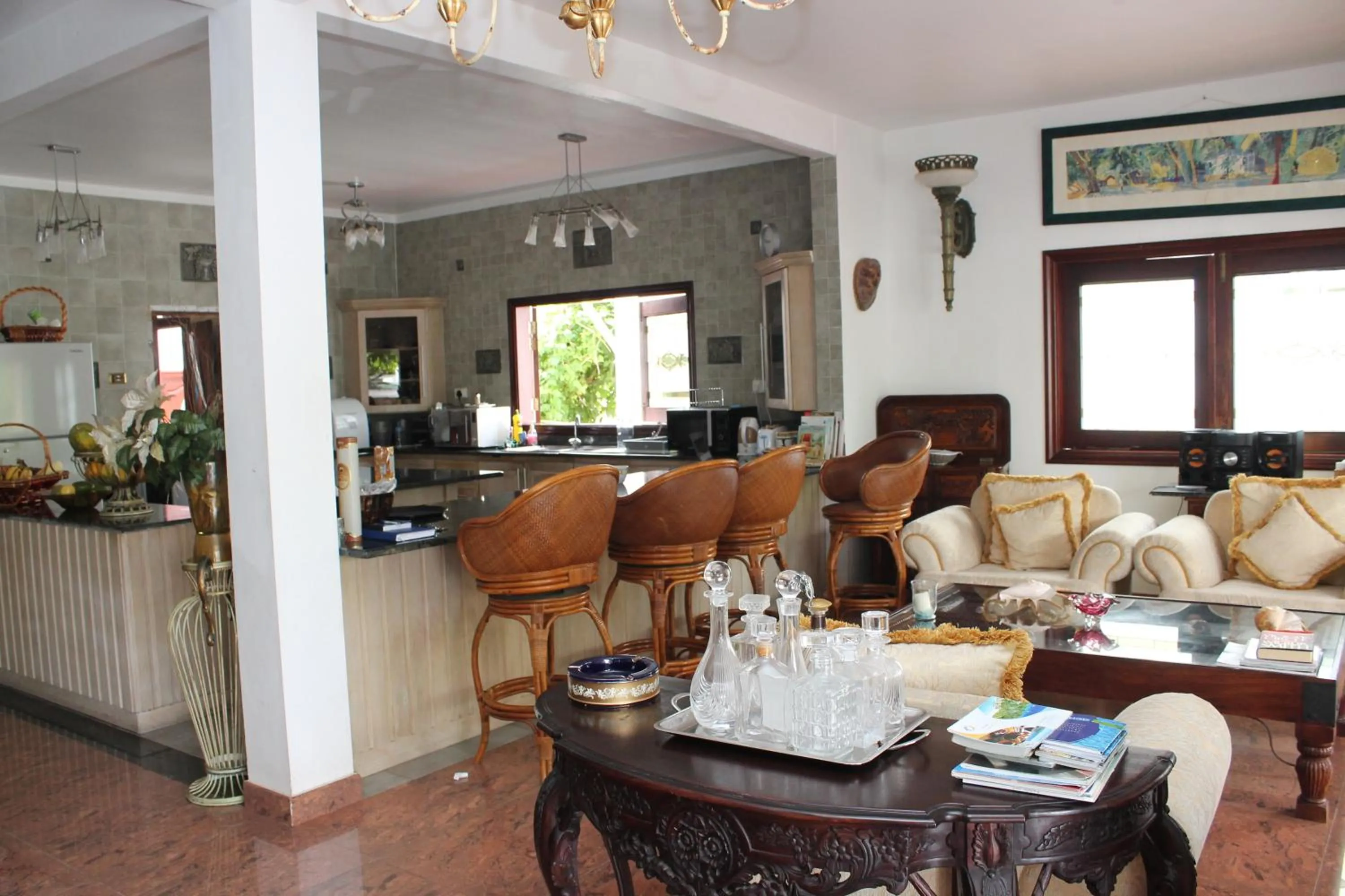 Communal lounge/ TV room in Le Bonheur Villa