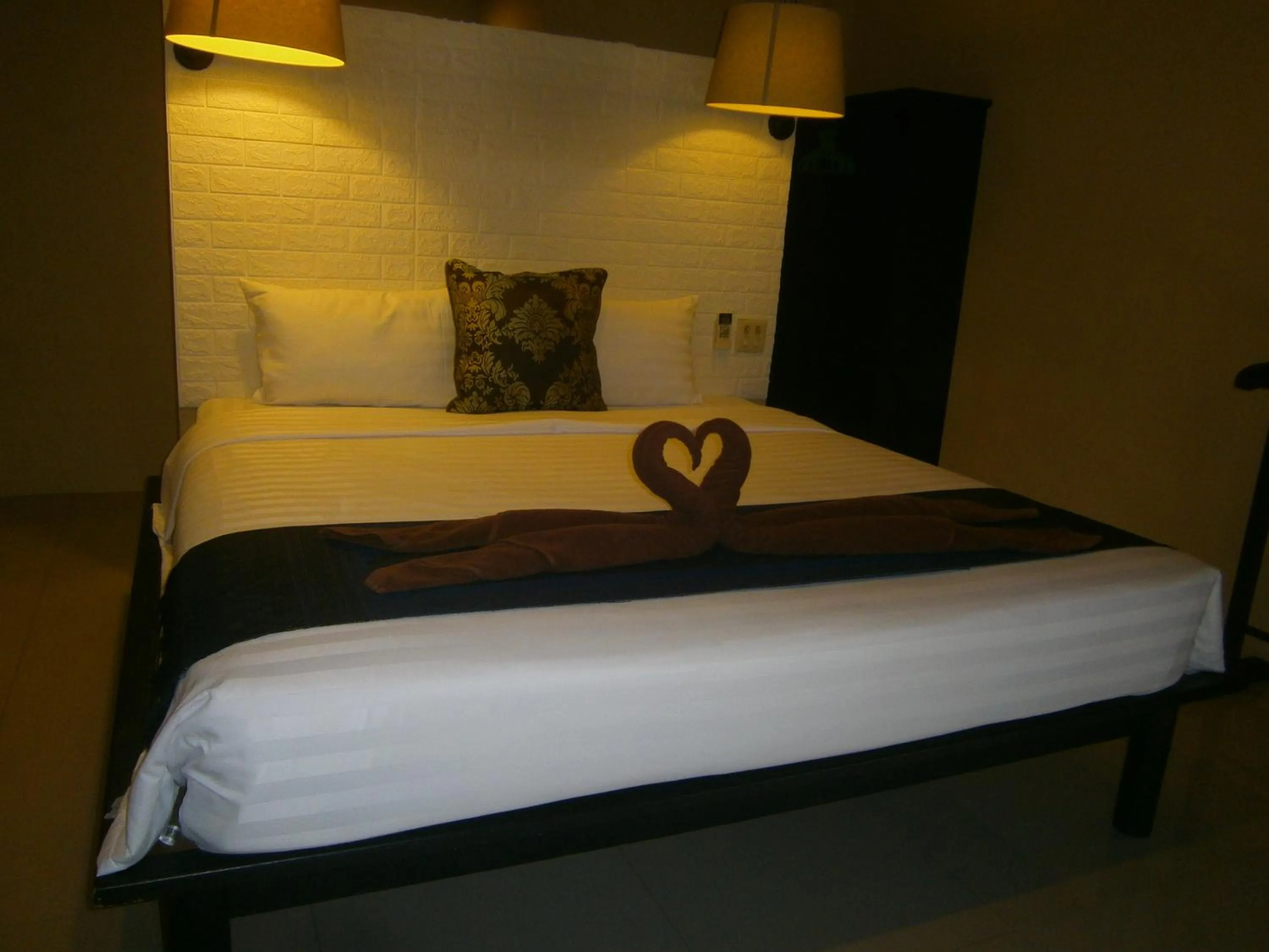 Bed in Infinity Boutique Hotel Kata Beach