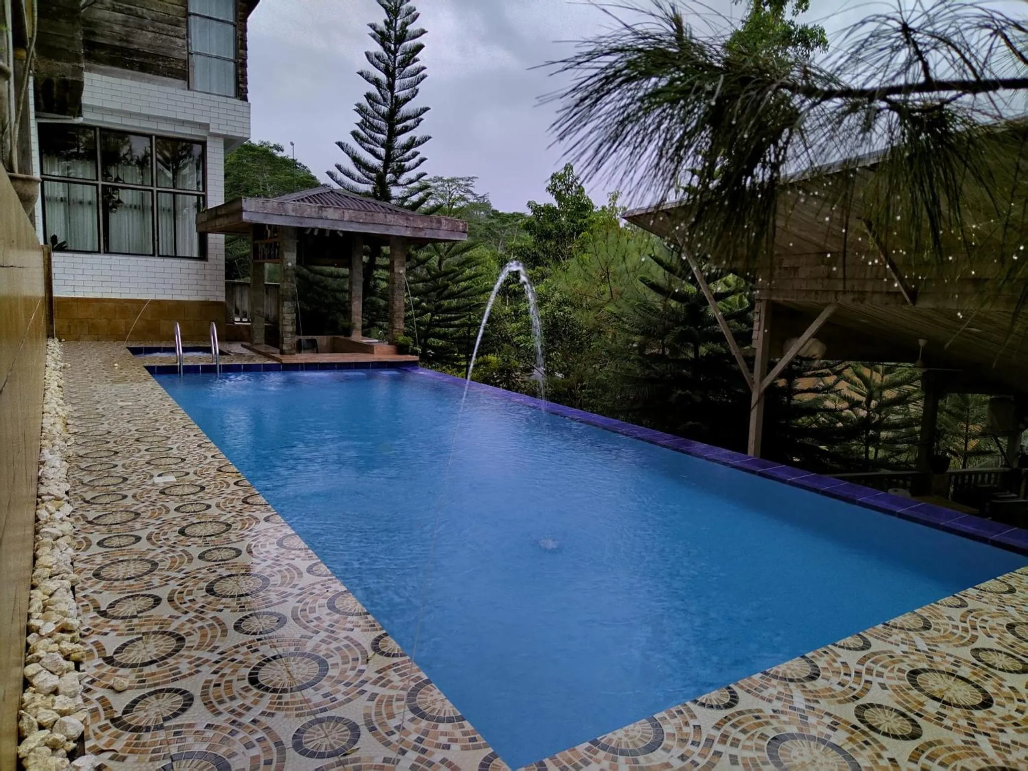 Swimming pool in The Farmhouse Private Resort
