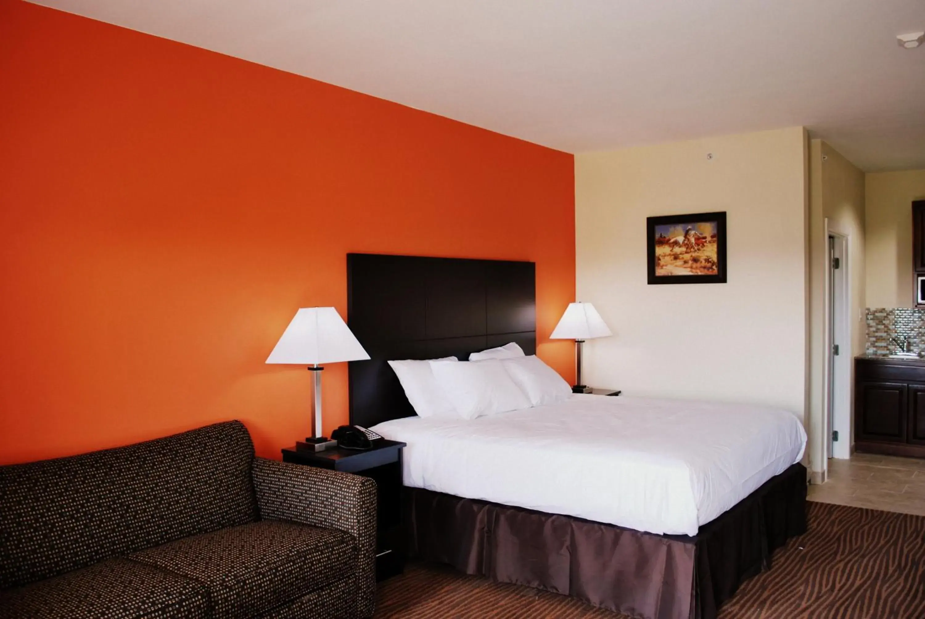 Bedroom in Westwood Inn & Suites Bedroom in Westwood Inn & Suites