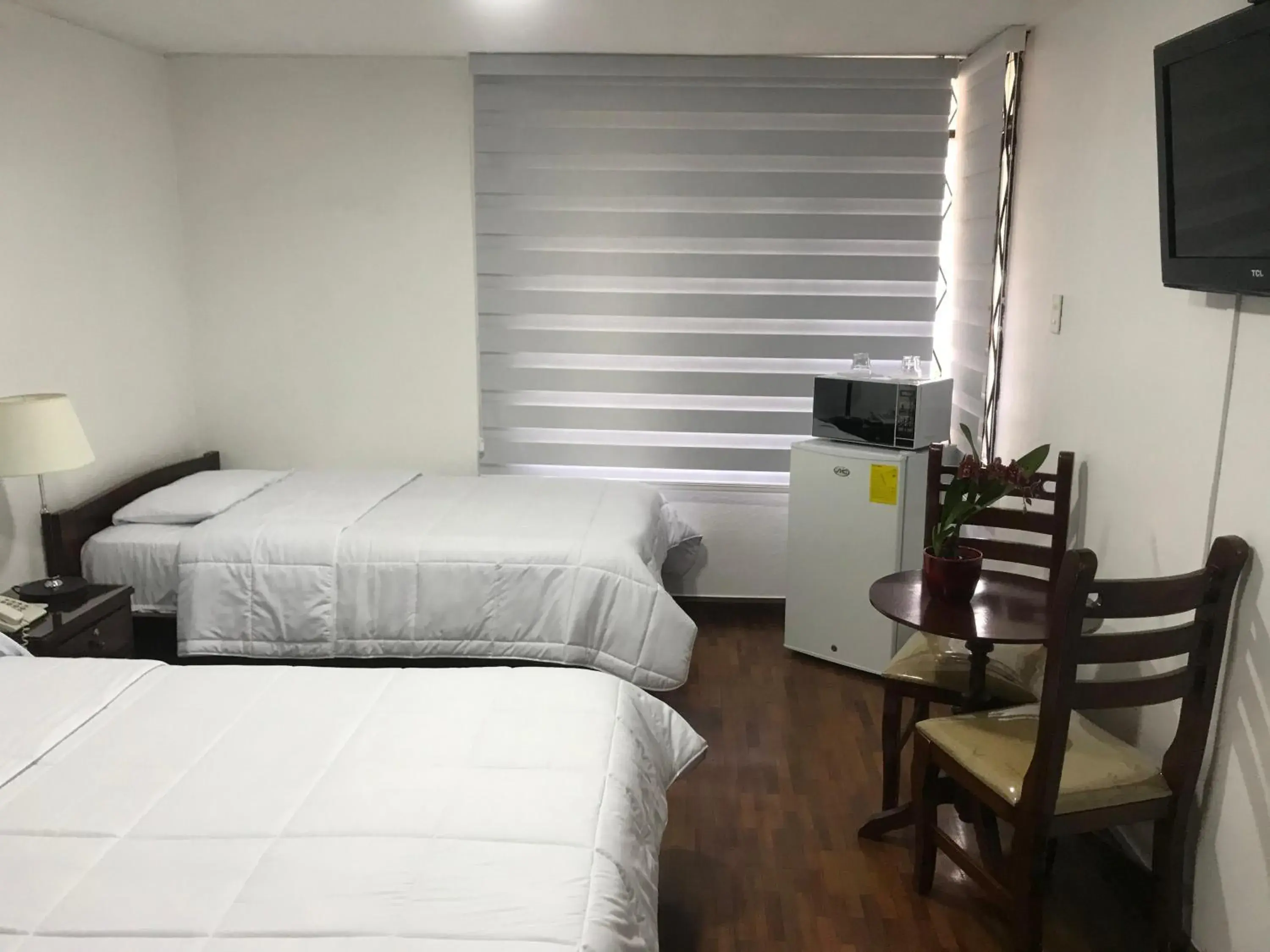 Triple Room with Bathroom - single occupancy in Altura Rooms & Suites Triple Room with Bathroom - single occupancy in Altura Rooms & Suites