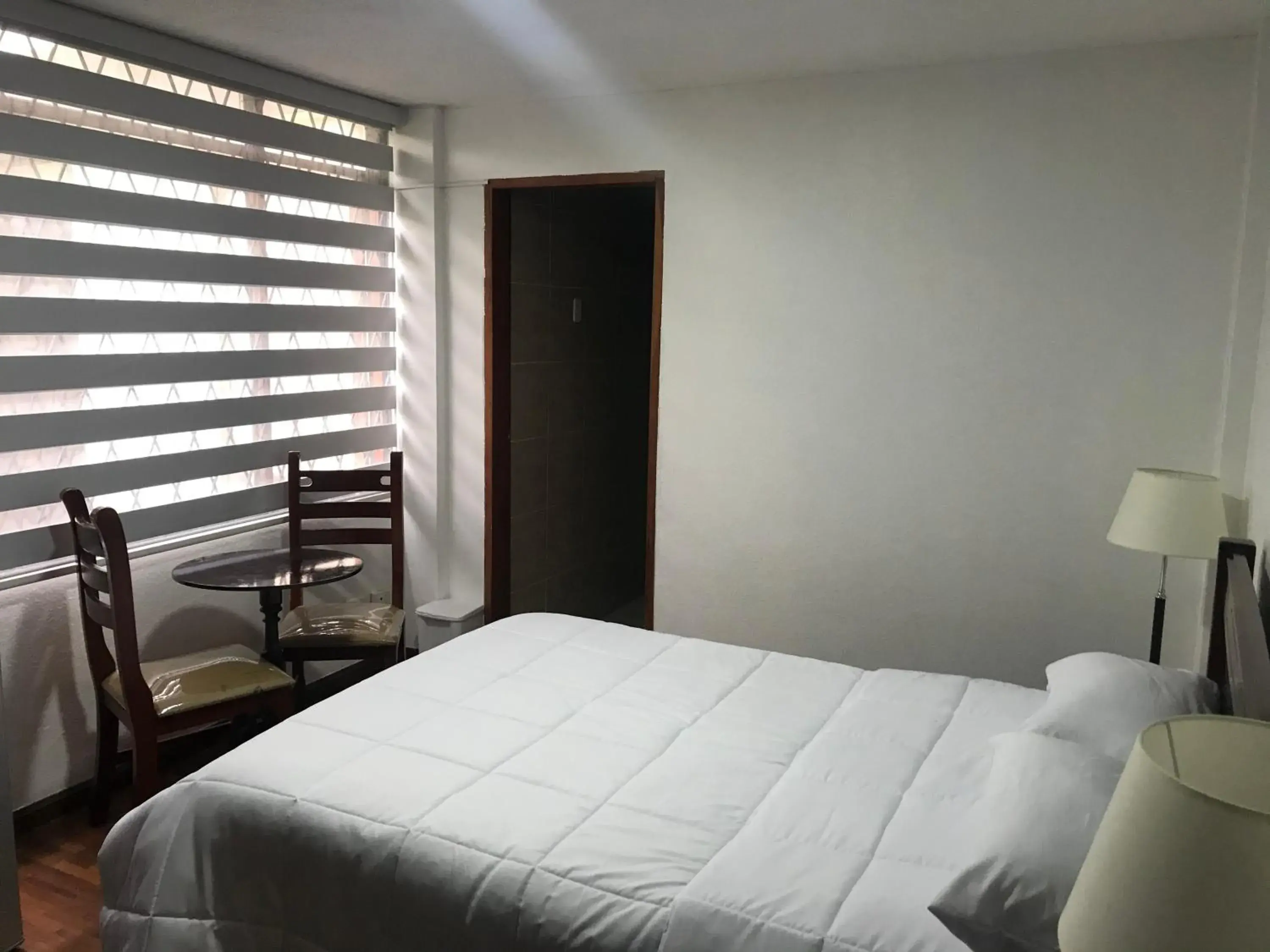 Budget Double Room - single occupancy in Altura Rooms & Suites Budget Double Room - single occupancy in Altura Rooms & Suites