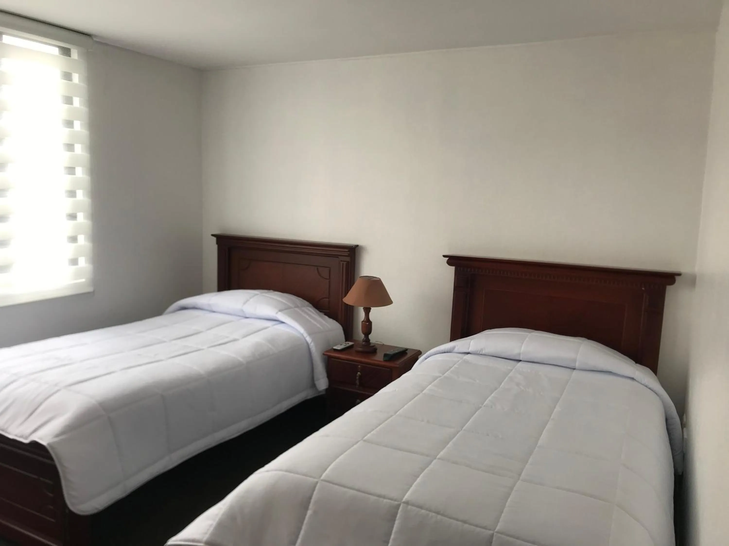 Bedroom, Bed in Altura Rooms & Suites