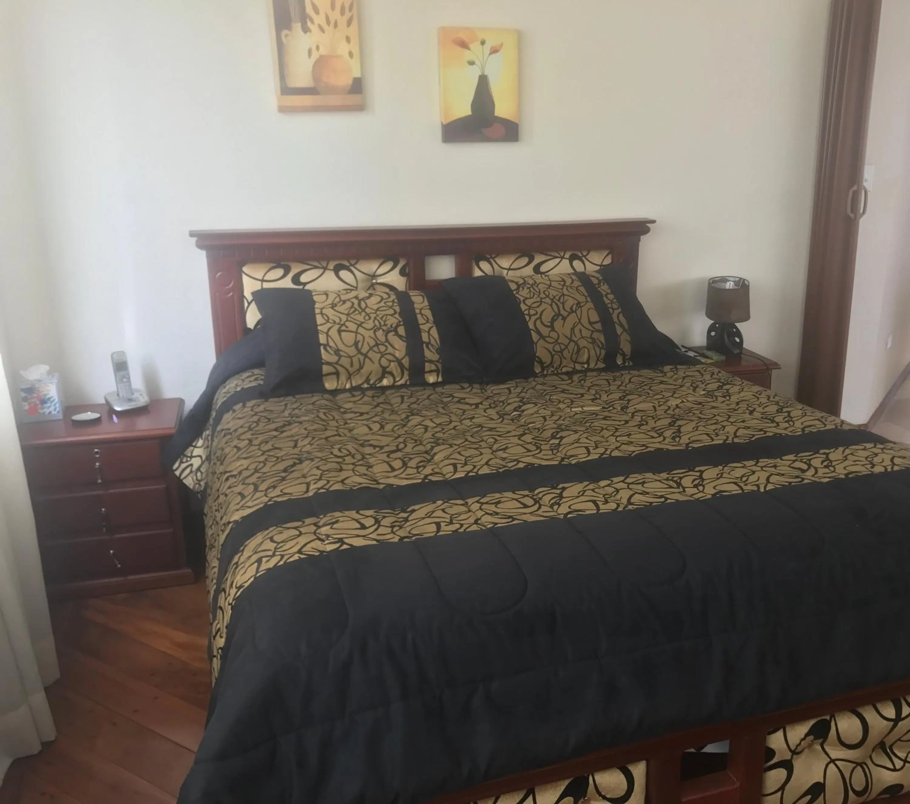 Bed in Altura Rooms & Suites