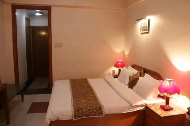 Bed in Hotel Abhinandan