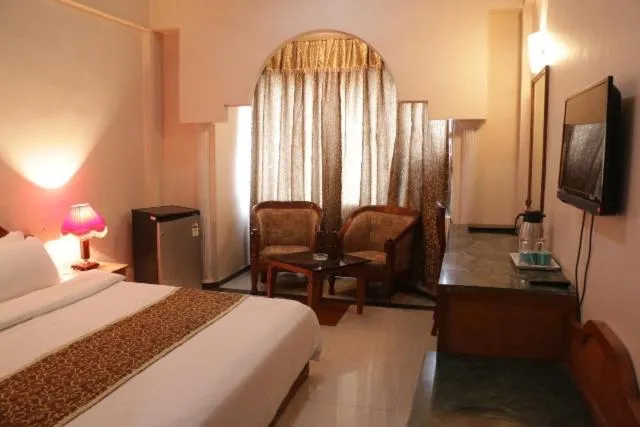 Photo of the whole room, Bed in Hotel Abhinandan