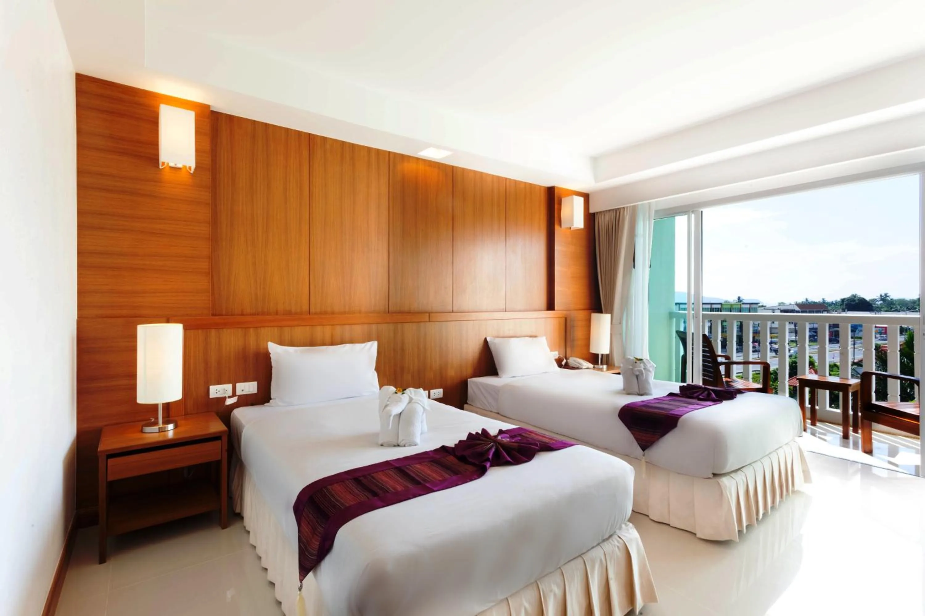 Bed in Rawai Princess Hotel