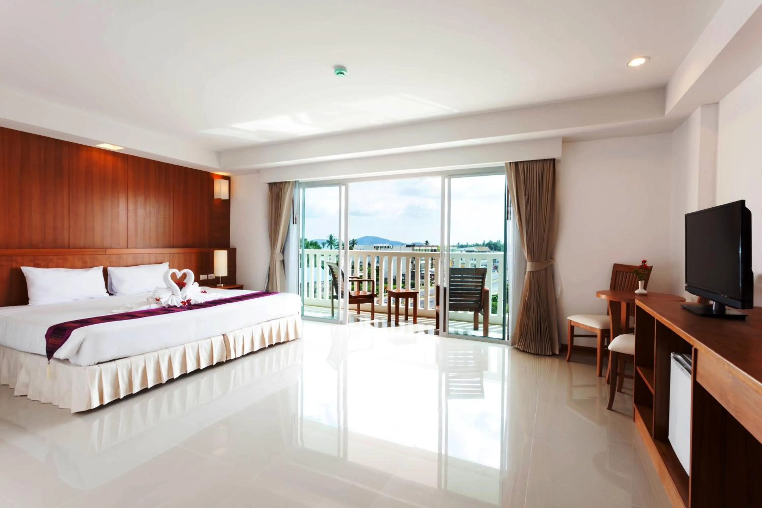 Bed in Rawai Princess Hotel