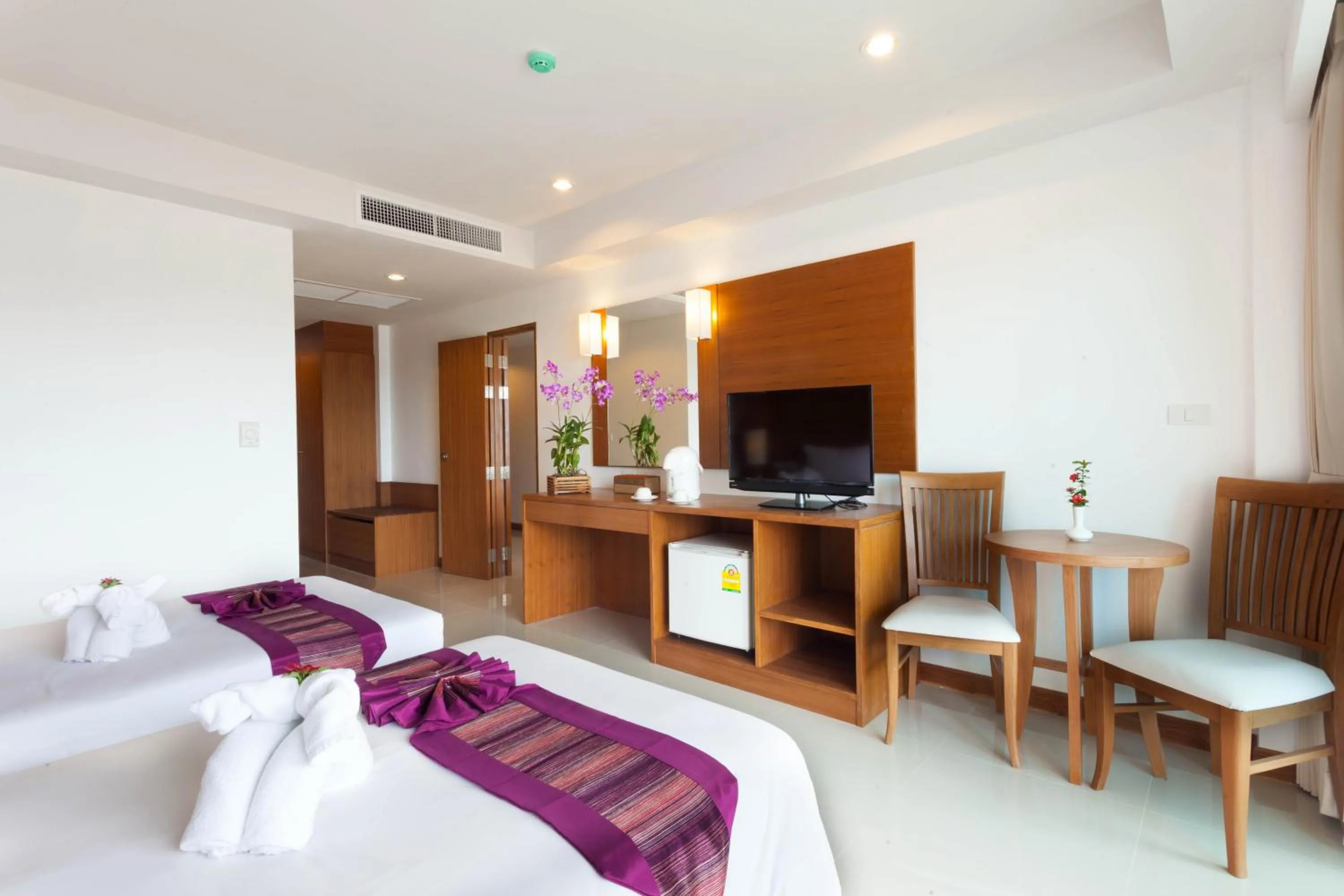 Bed in Rawai Princess Hotel