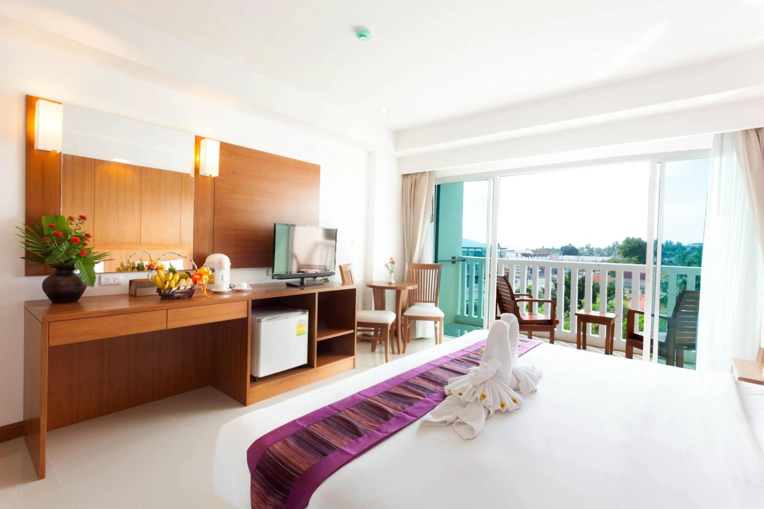 Bed in Rawai Princess Hotel