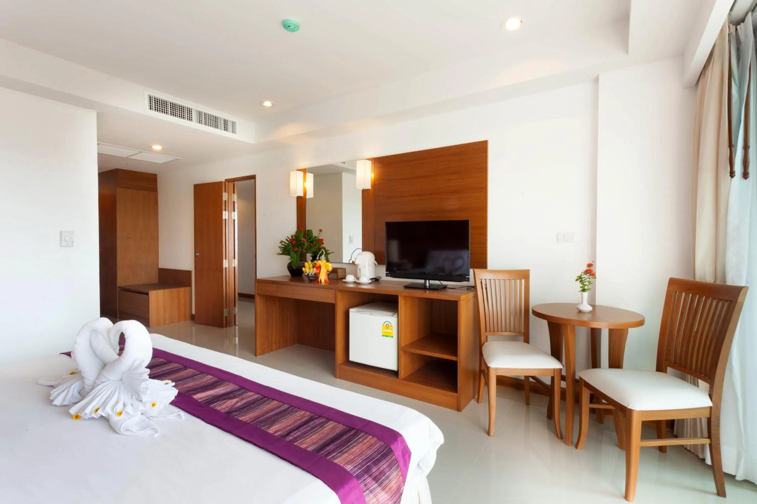 Bed in Rawai Princess Hotel