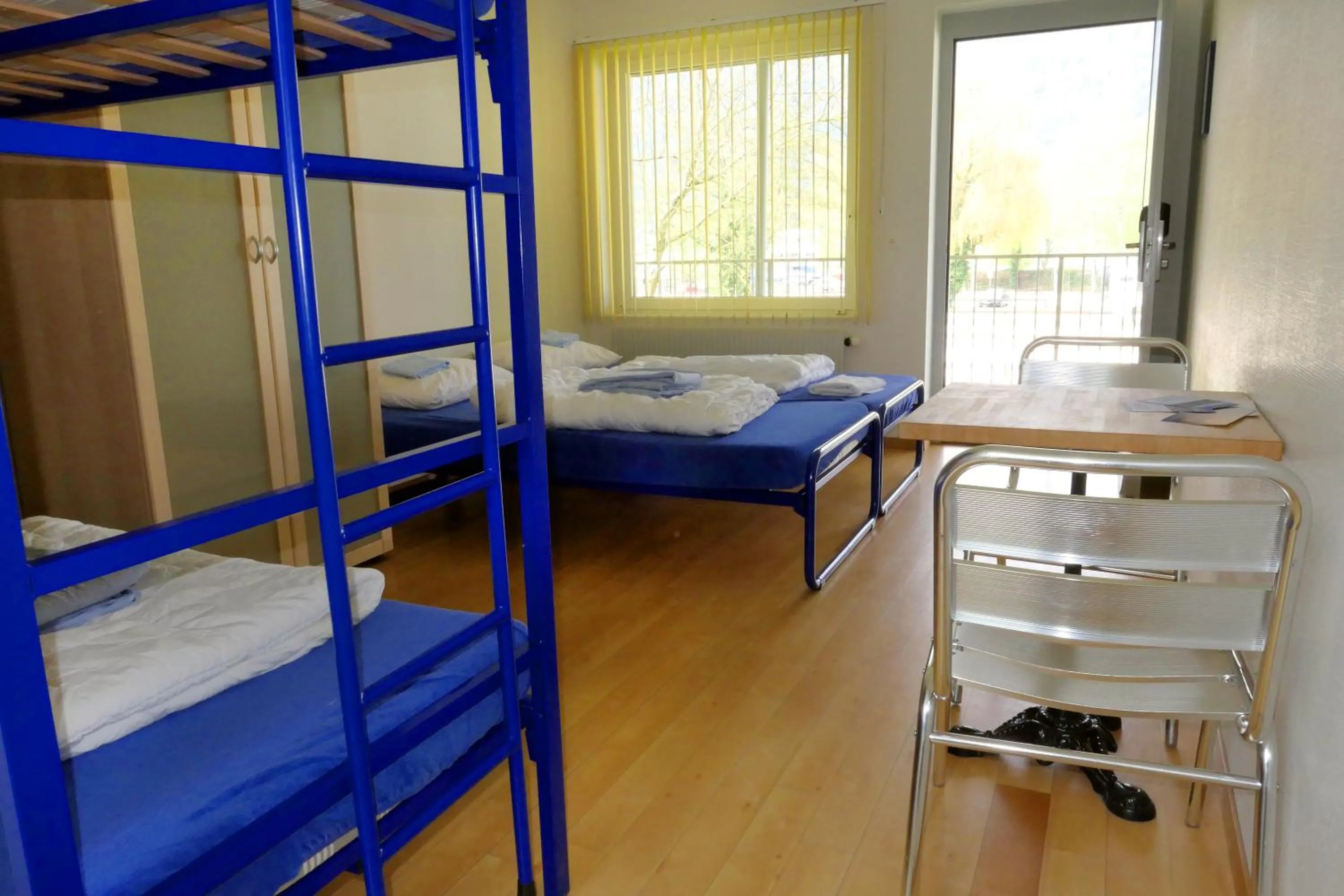 Bed in Swiss Hostel Lago Lodge