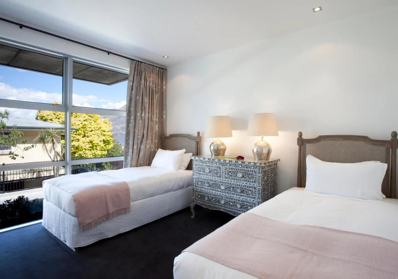 Bed in Kakara Moana by MajorDomo - Lake Views & Spa Pool