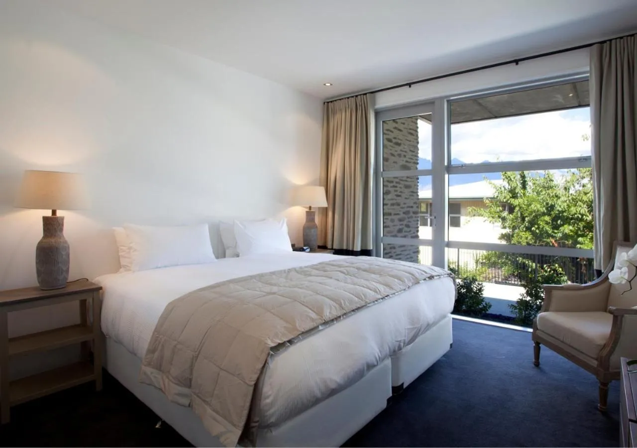 Bed in Kakara Moana by MajorDomo - Lake Views & Spa Pool