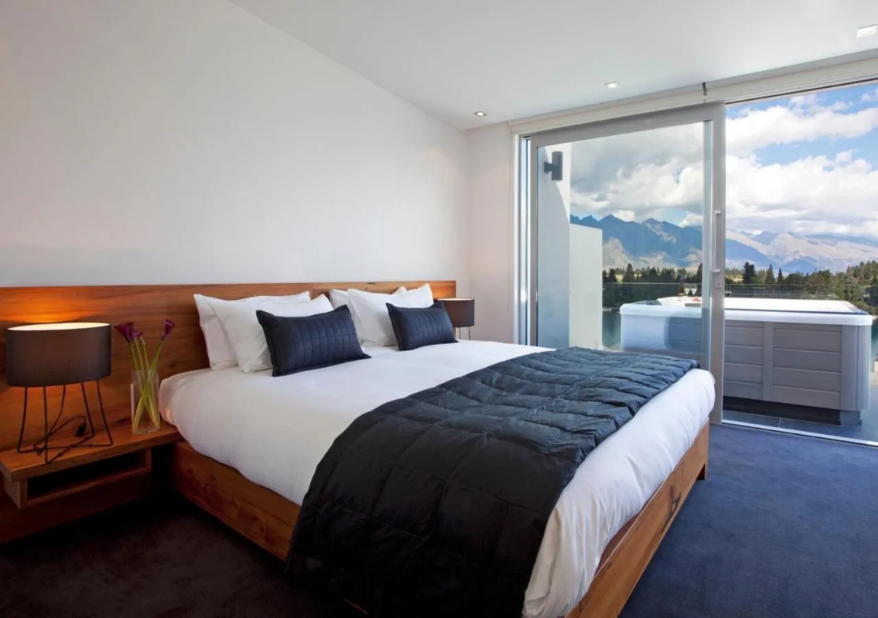 Bed in Kakara Moana by MajorDomo - Lake Views & Spa Pool